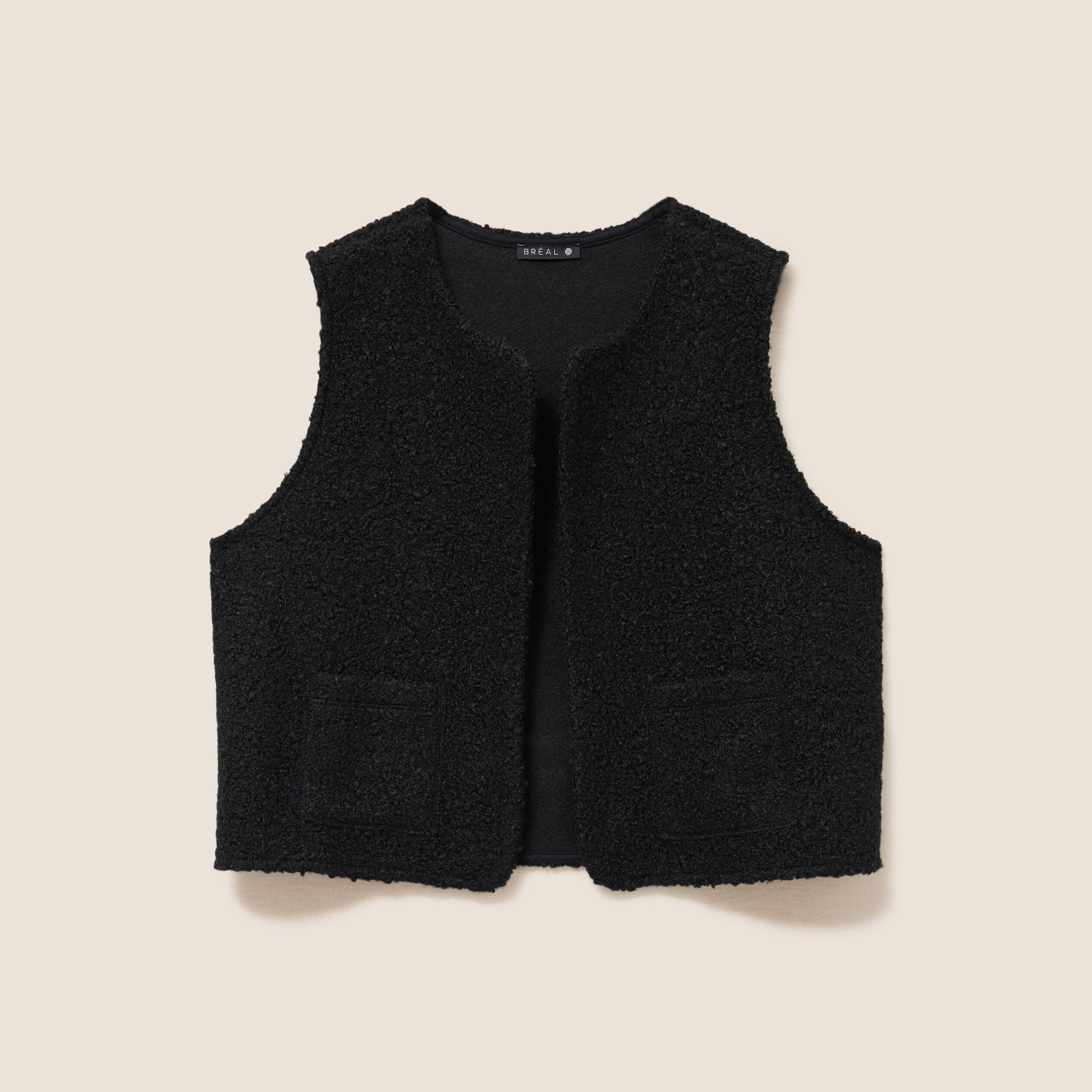 Gilet sans manches bouclette poches noir femme