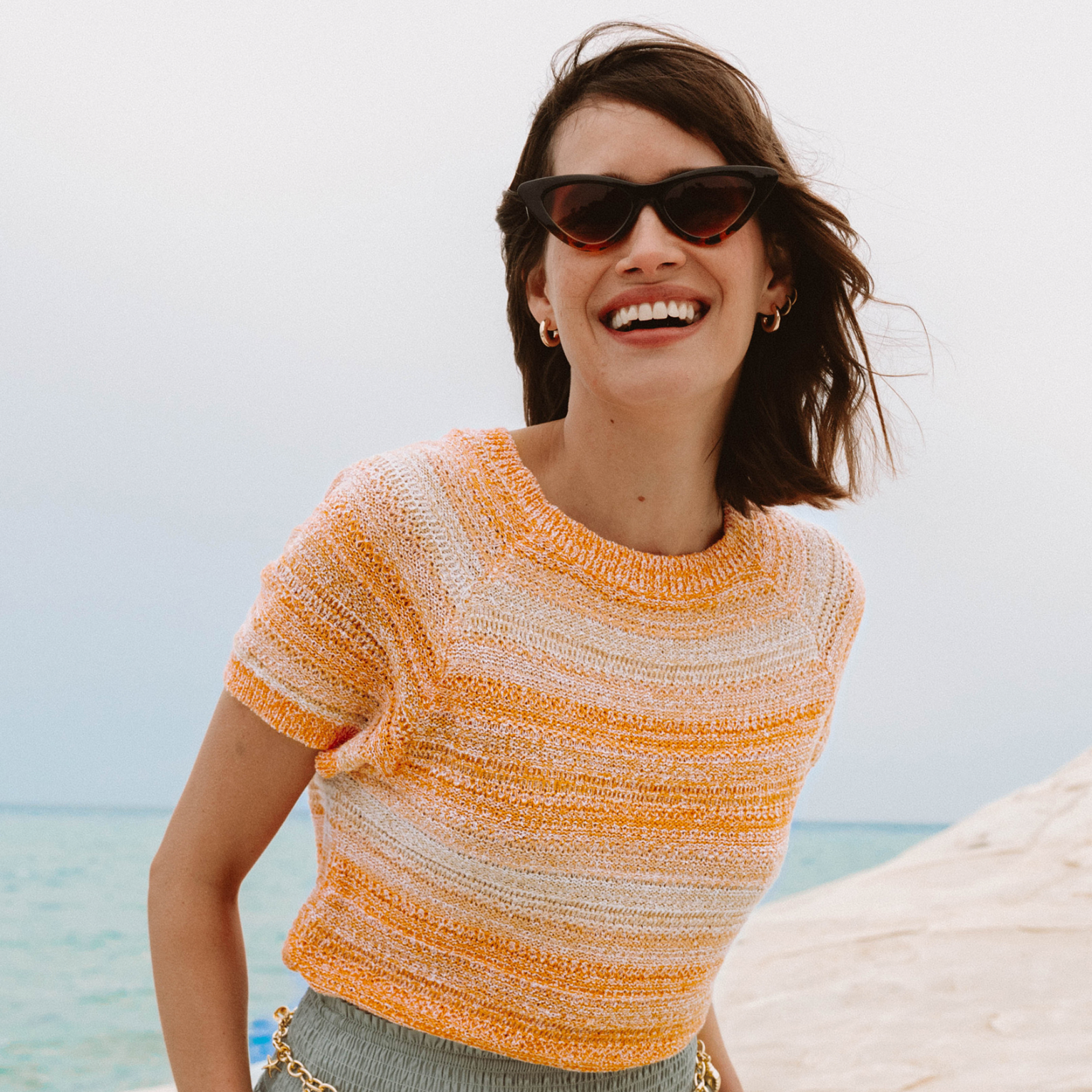 Pull col v manches courtes orange fluo femme