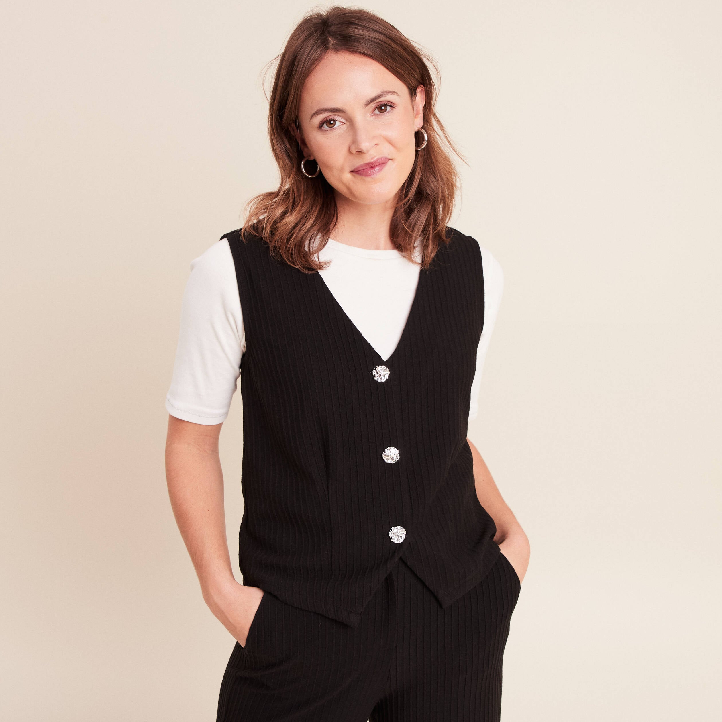Gilet droit court sans manches col v noir femme