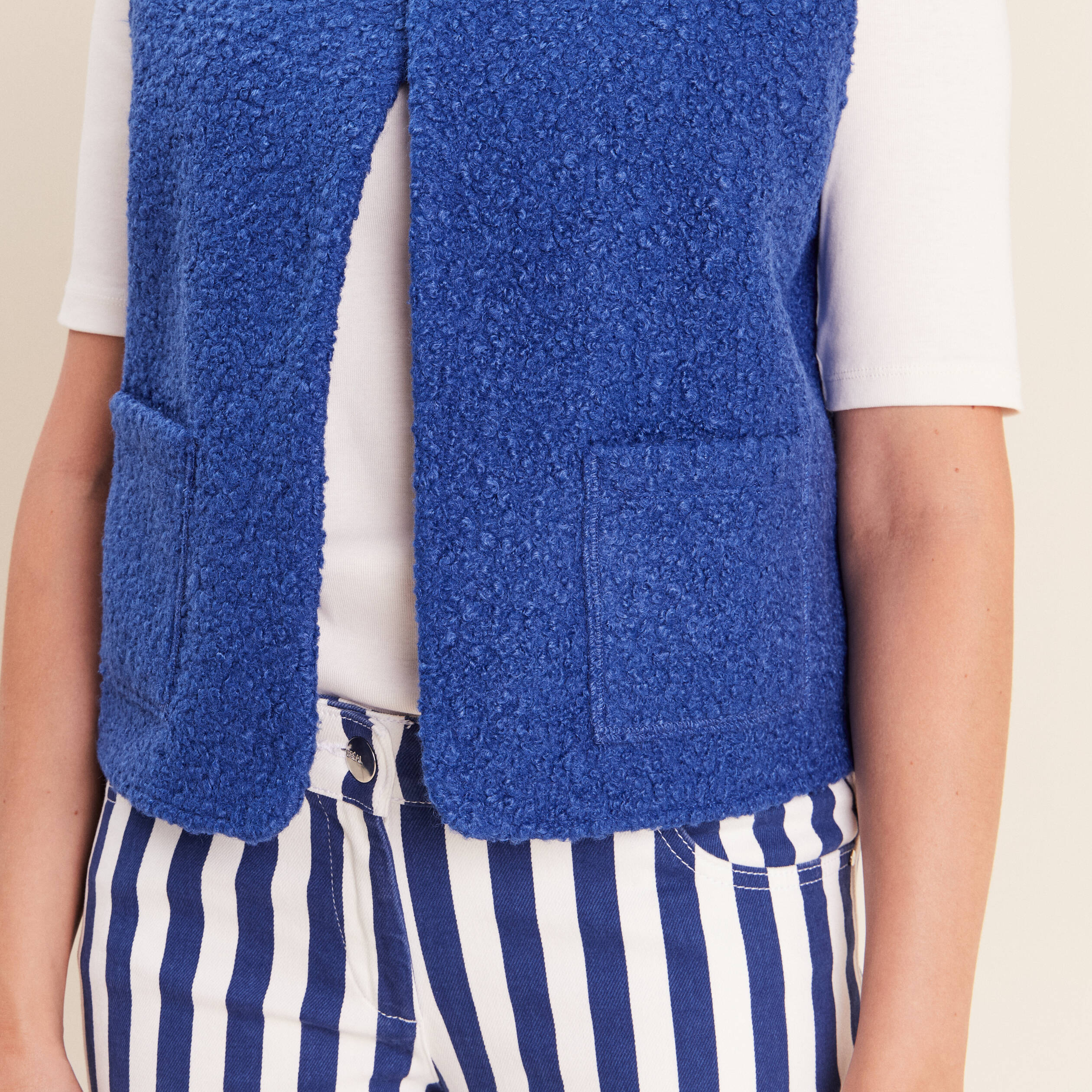 Gilet sans manches bouclette poches bleu fonc&eacute; femme
