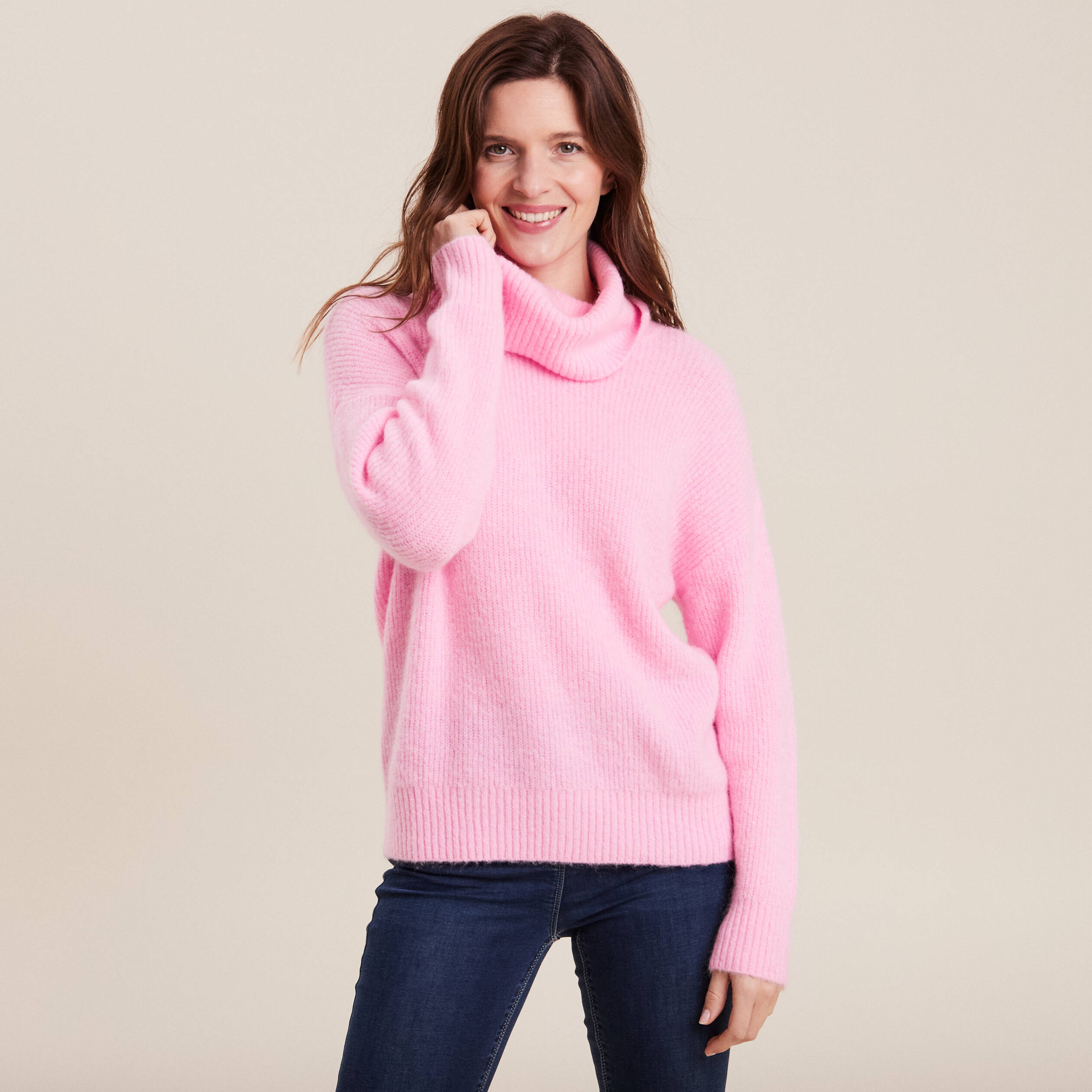 Pull manches longues col roulé rose vif femme