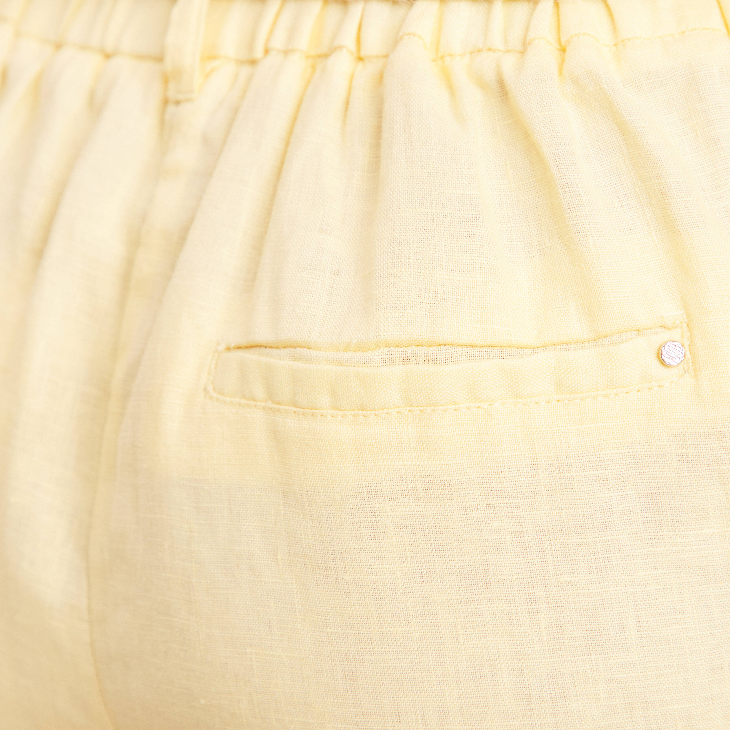Pantalon flou ceinturé jaune clair femme