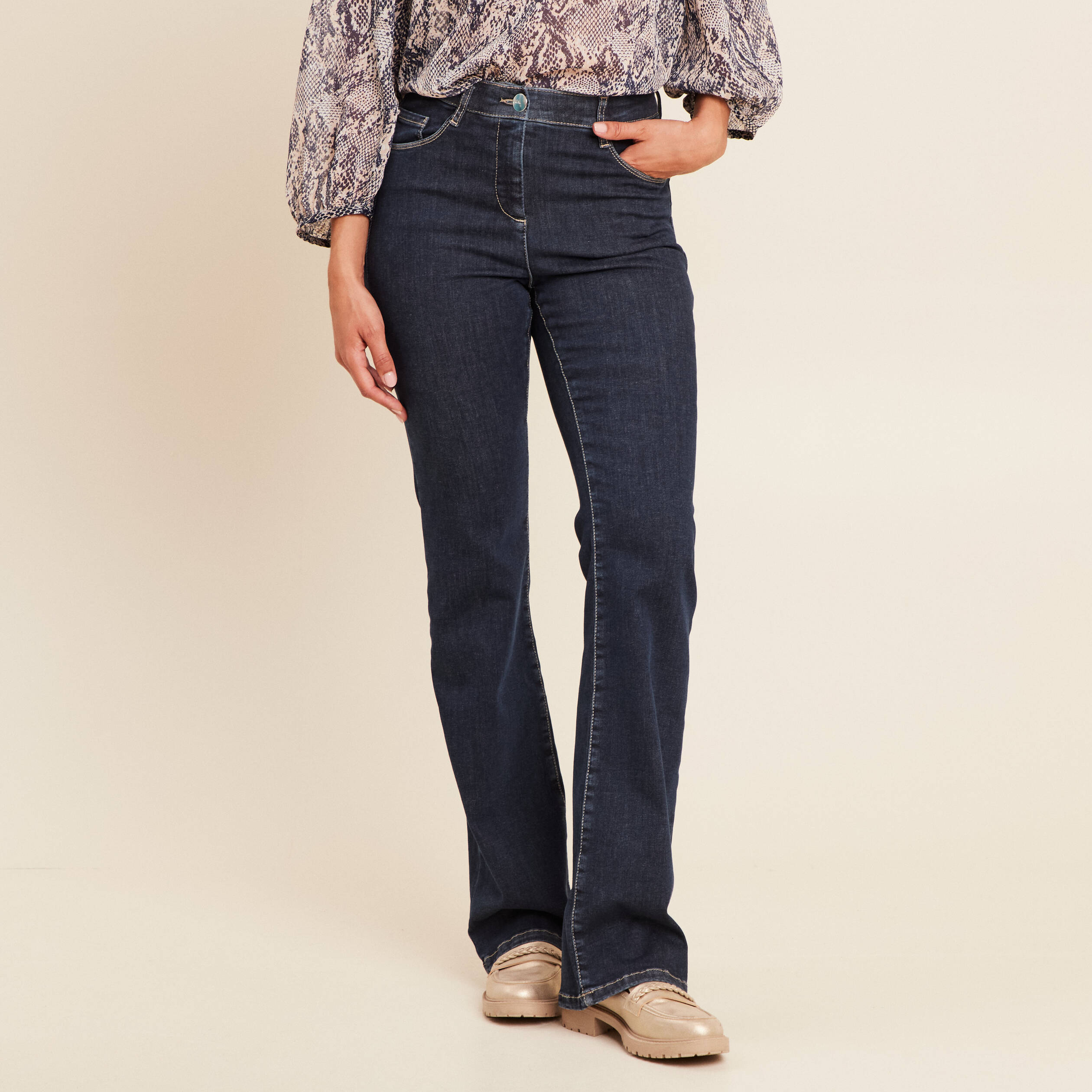 Jean magique L'Unique coupe bootcut denim brut femme