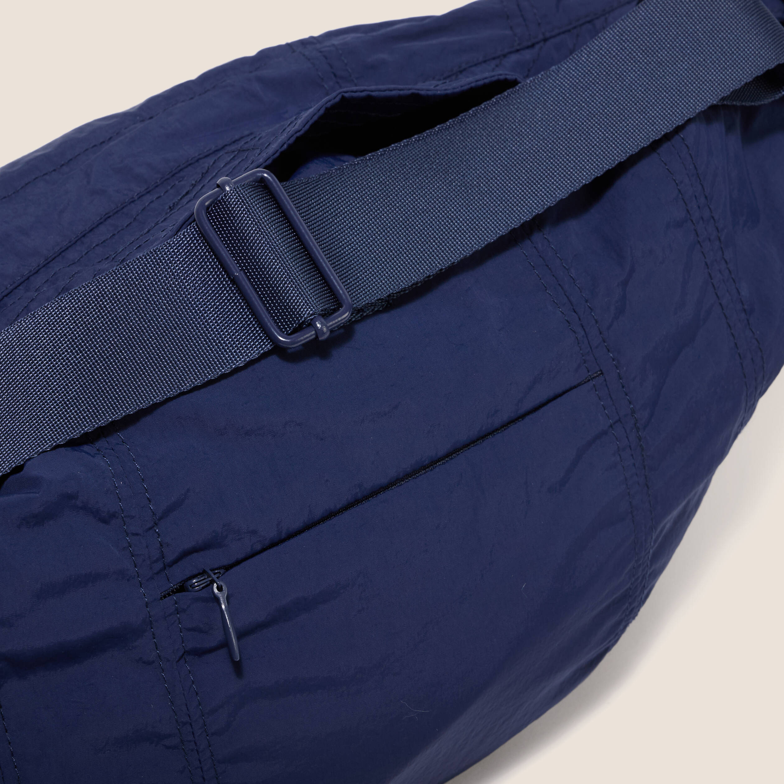 Coupe-vent pliable sac banane bleu marine femme