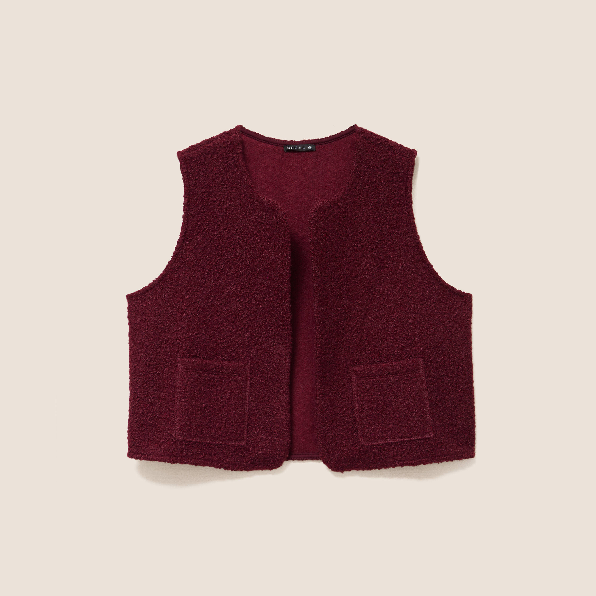 Gilet sans manches bouclette poches bordeaux femme
