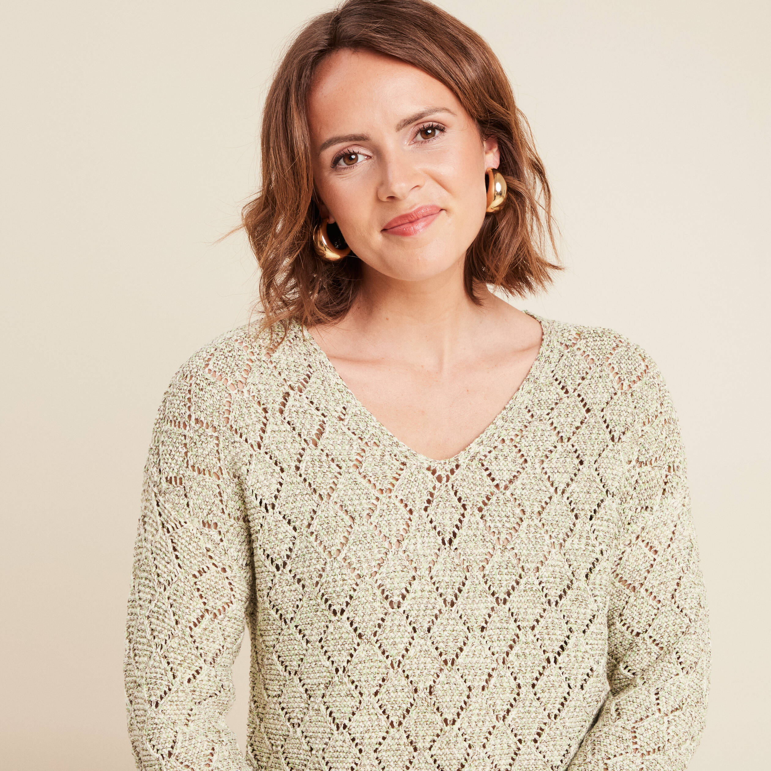 Pull manches longues ajour&eacute; vert femme
