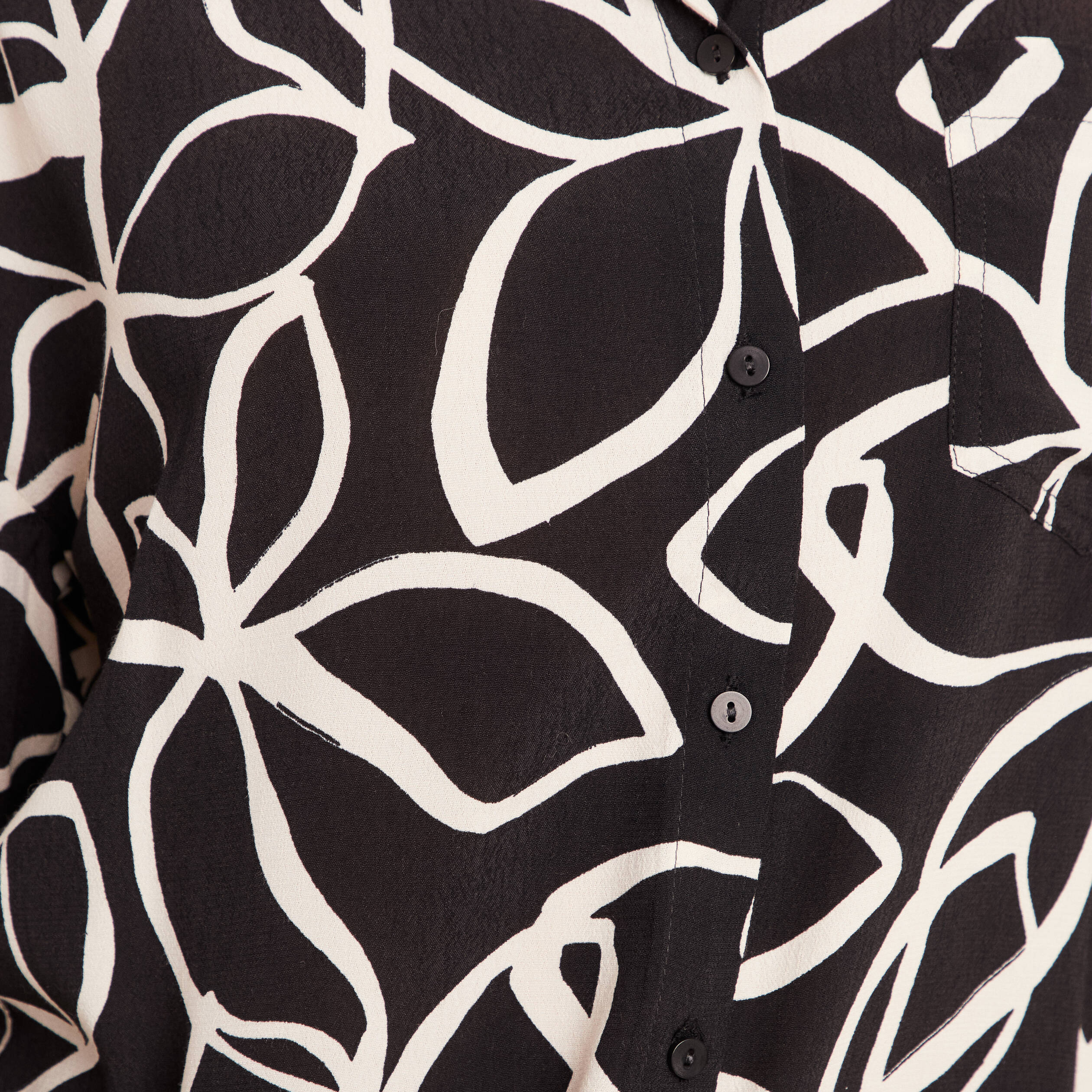 Chemise ample mi-longue manches longues noir femme