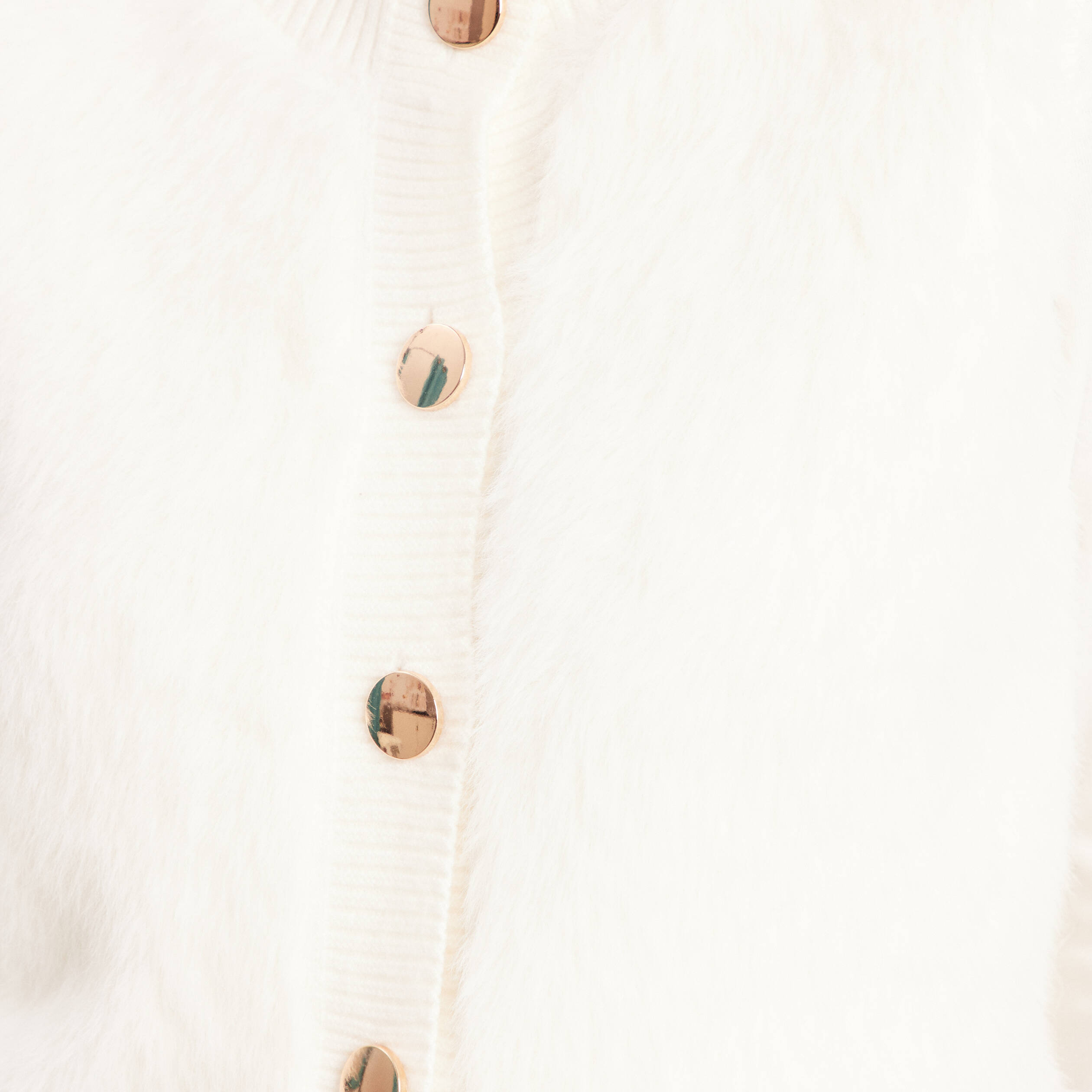 Gilet sans manches duveteux ecru femme