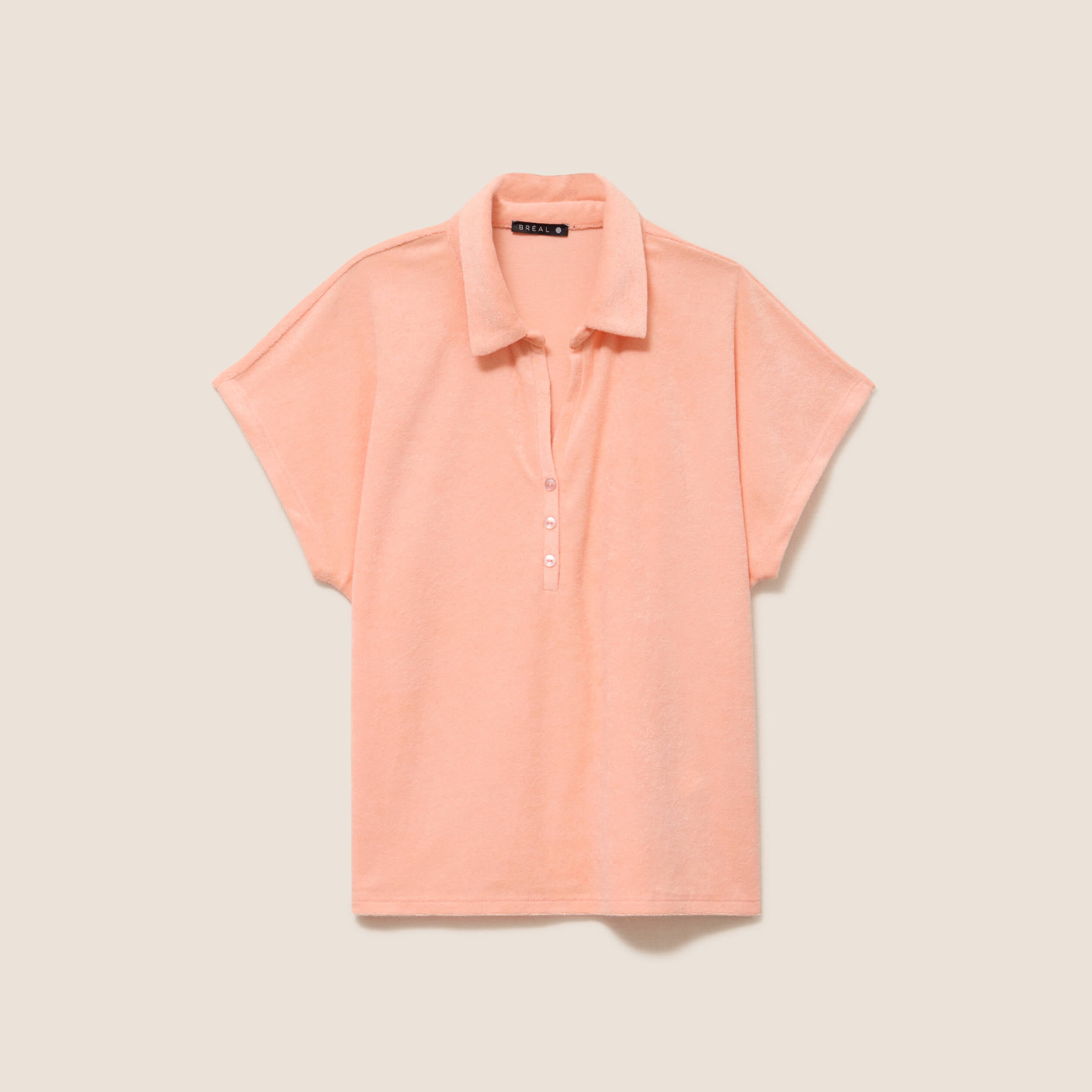 Polo droit col chemise manches courtes orange abricot femme