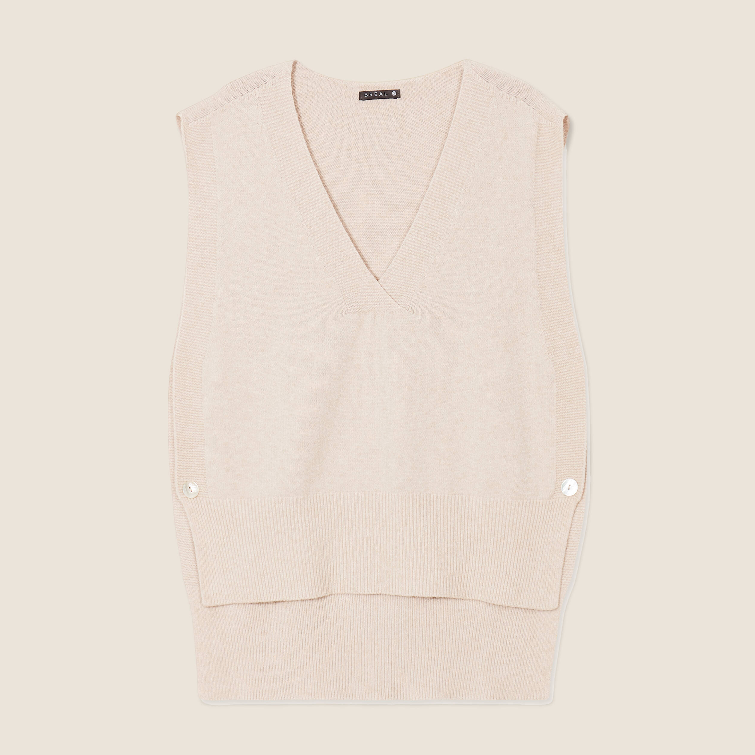 Pull sans manches creme femme