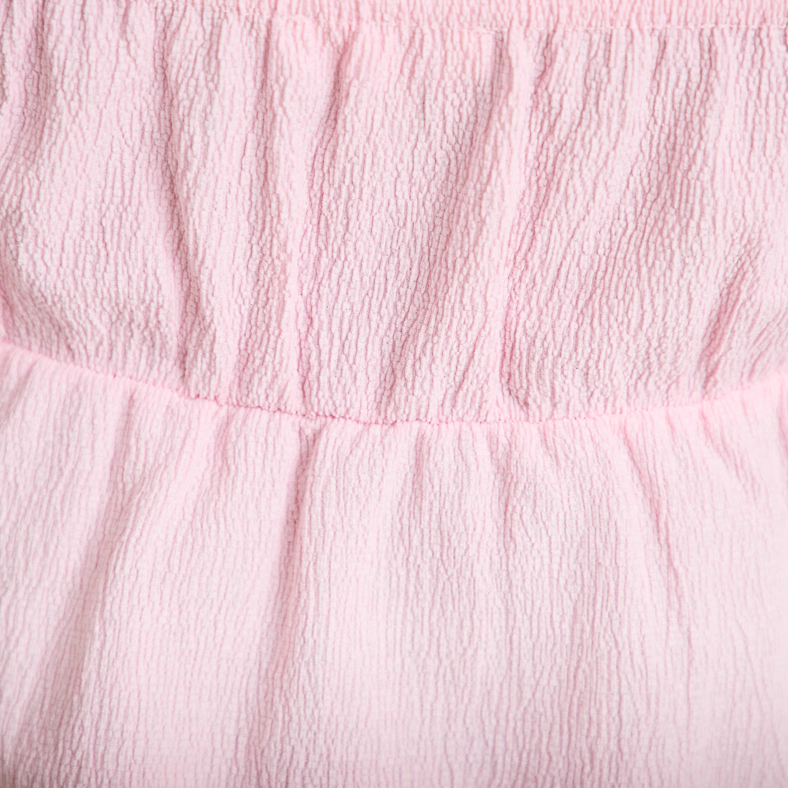 D&eacute;bardeur d&eacute;tail bijou rose clair femme