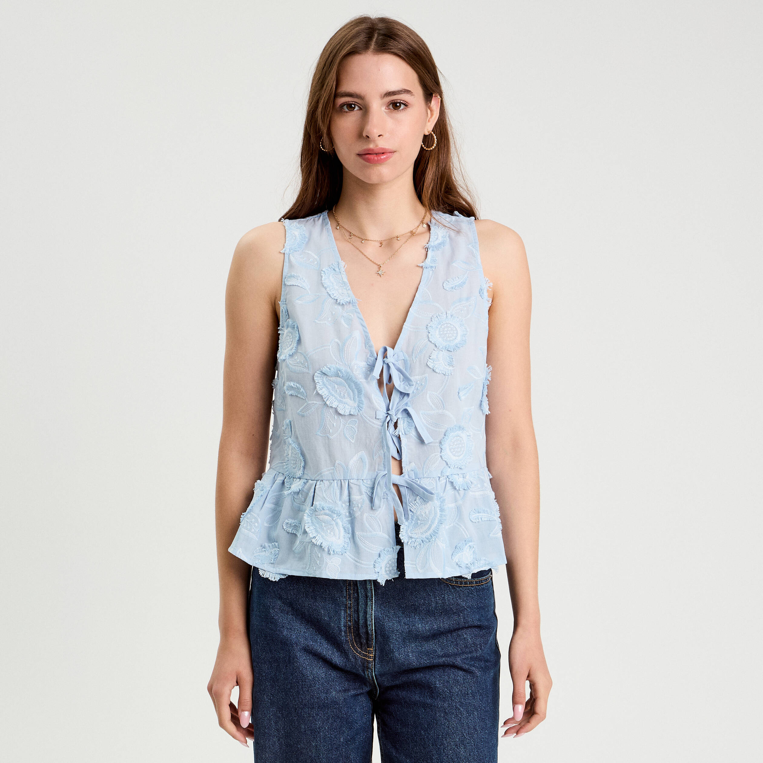 blouse sans manches nouee bleu femme Blouse sans manches nouée bleu femme