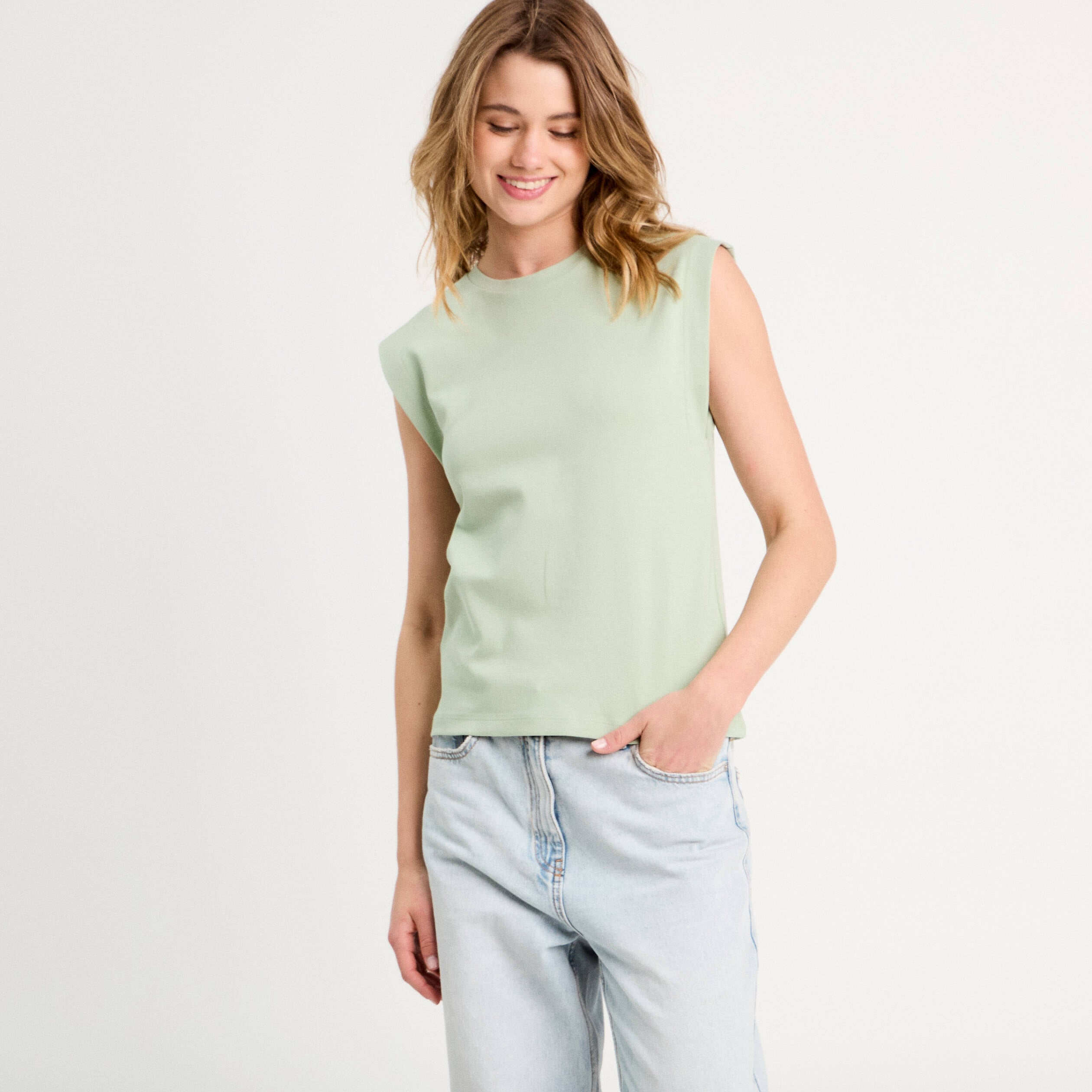 T-shirt col rond sans manches vert pastel femme