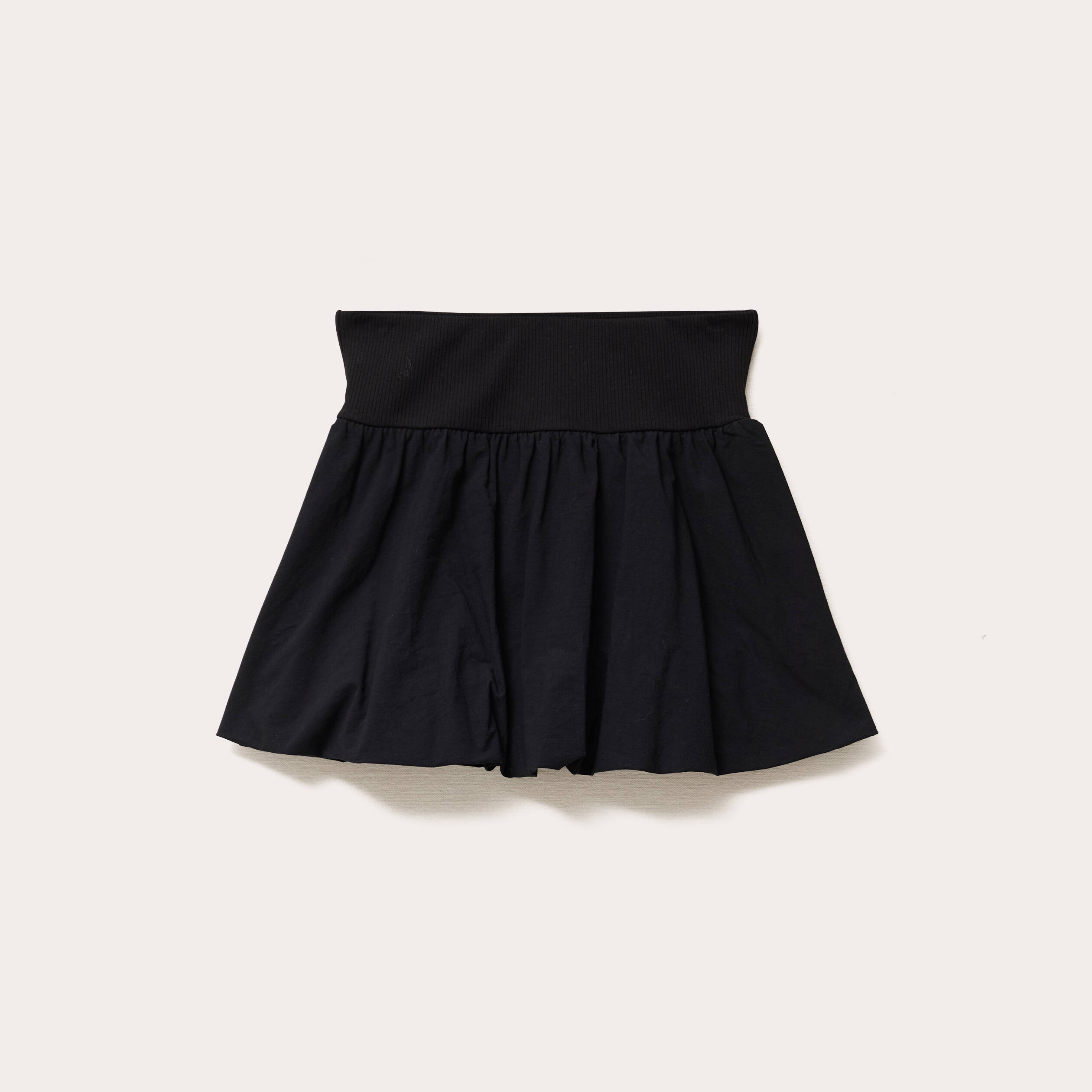 Jupe courte évasée effet boule noir femme