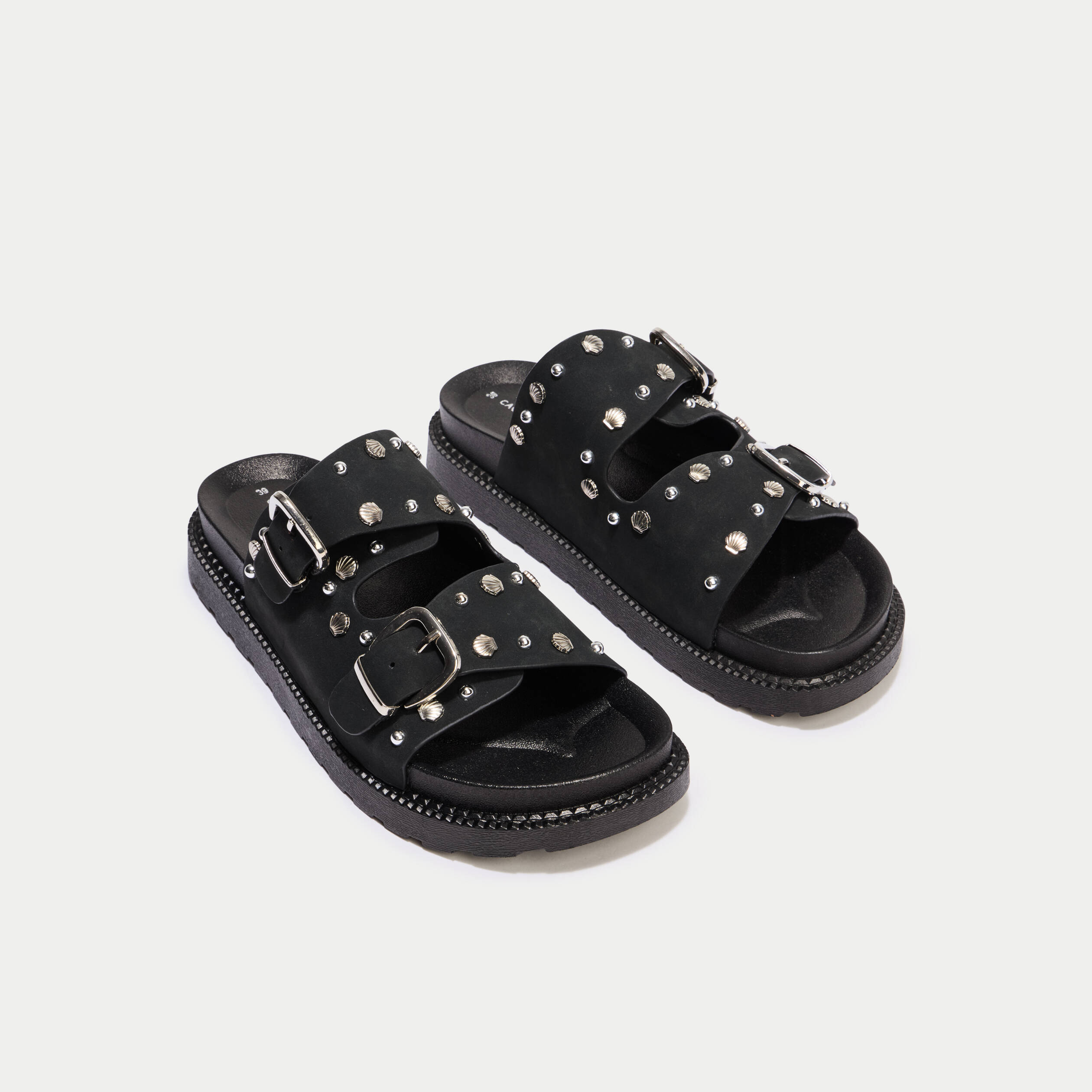 Mules &agrave; d&eacute;tails clout&eacute;s noir femme