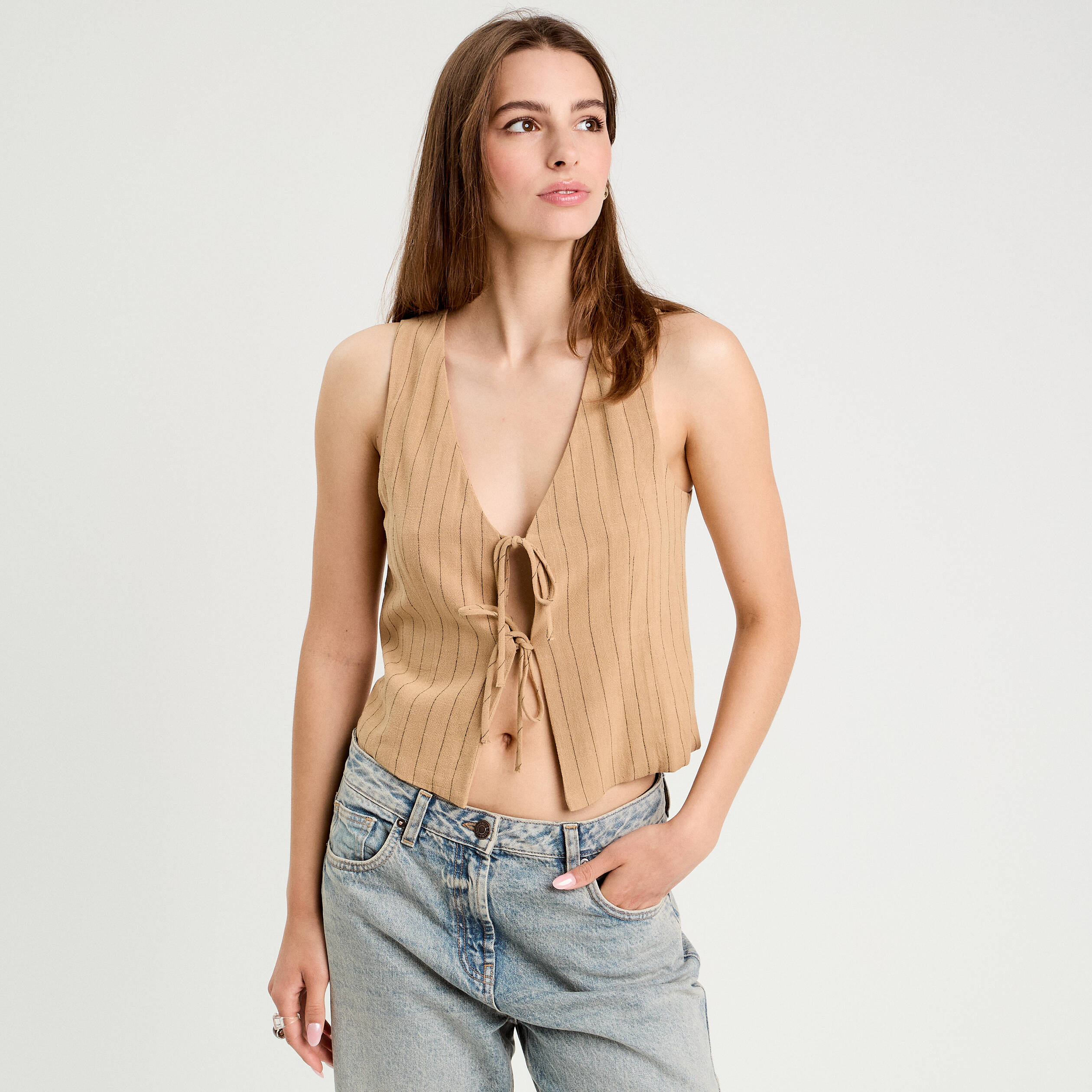 veston sans manches noue beige femme Veston sans manches noué beige femme