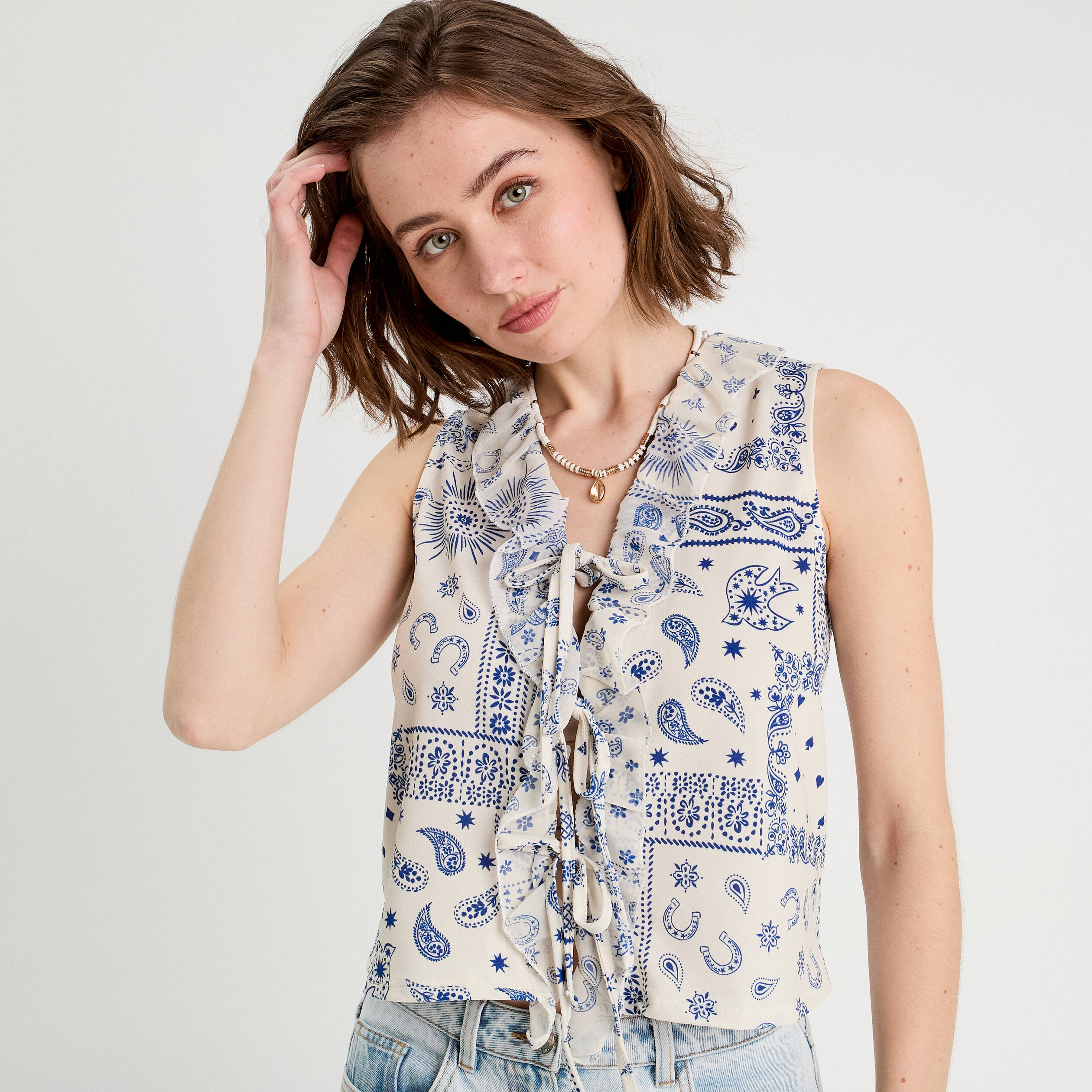 Blouse nou&eacute;e sans manches blanc femme
