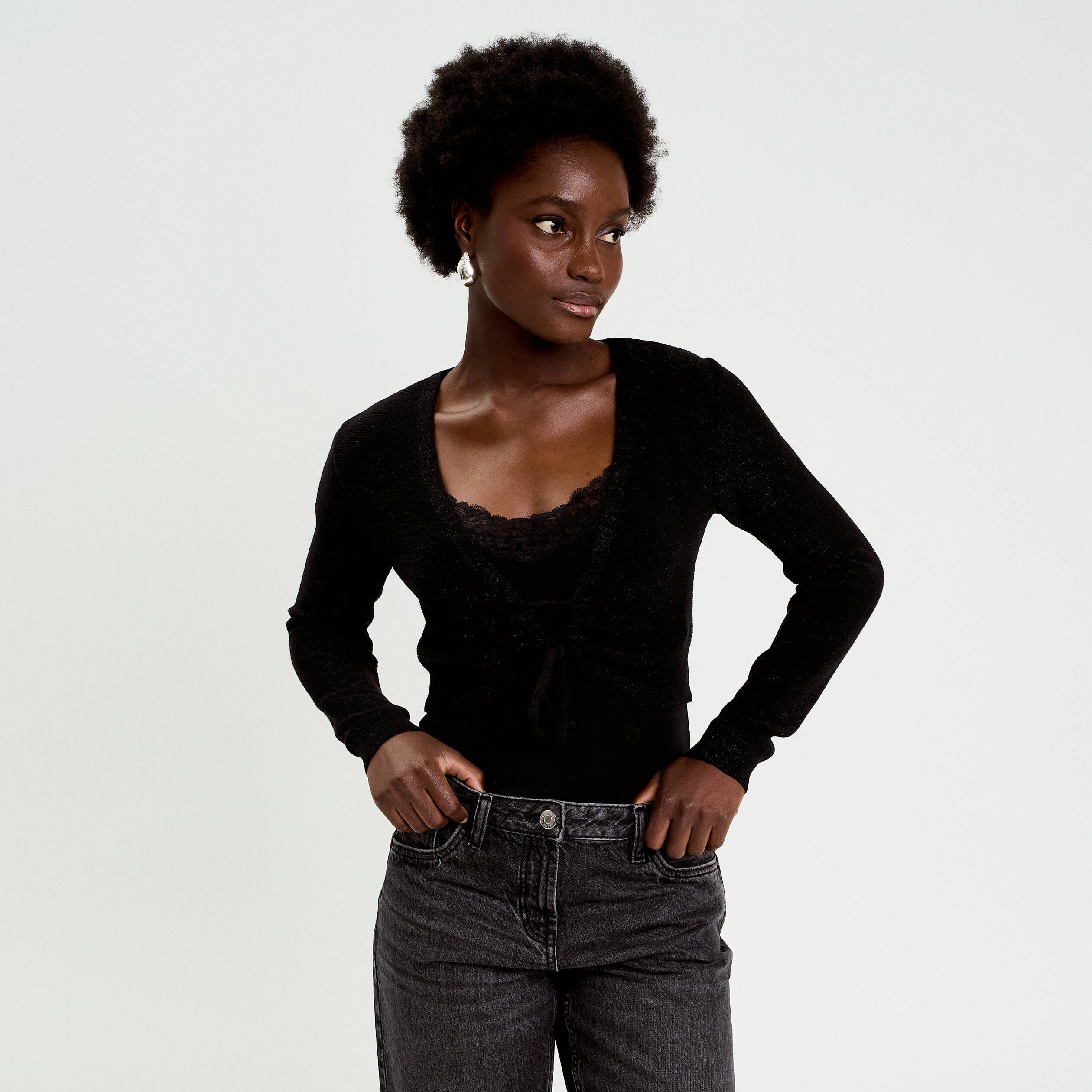 Pull cropped avec noeud noir femme