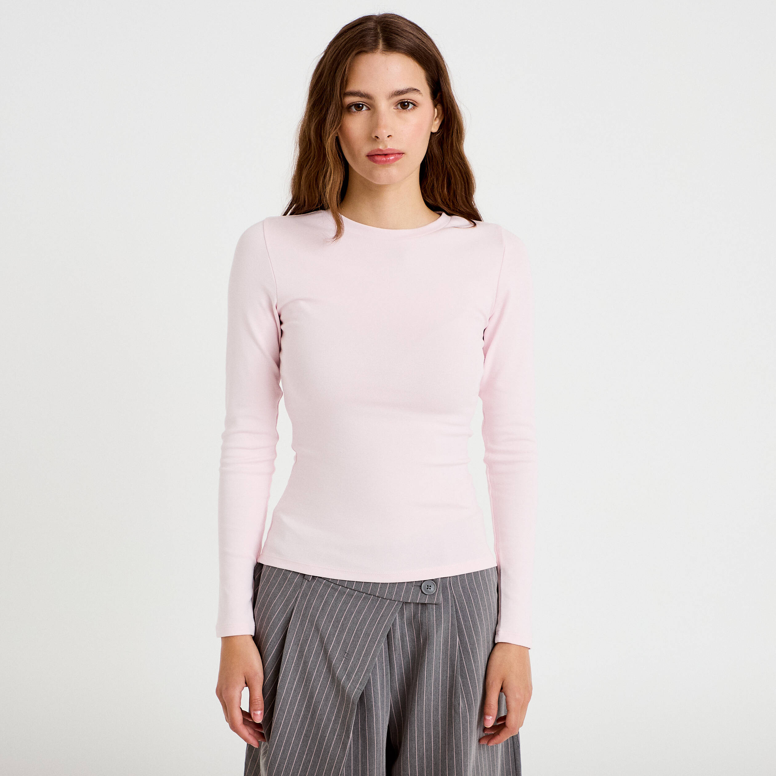 T-shirt cintr&eacute; col rond manches longues rose clair femme