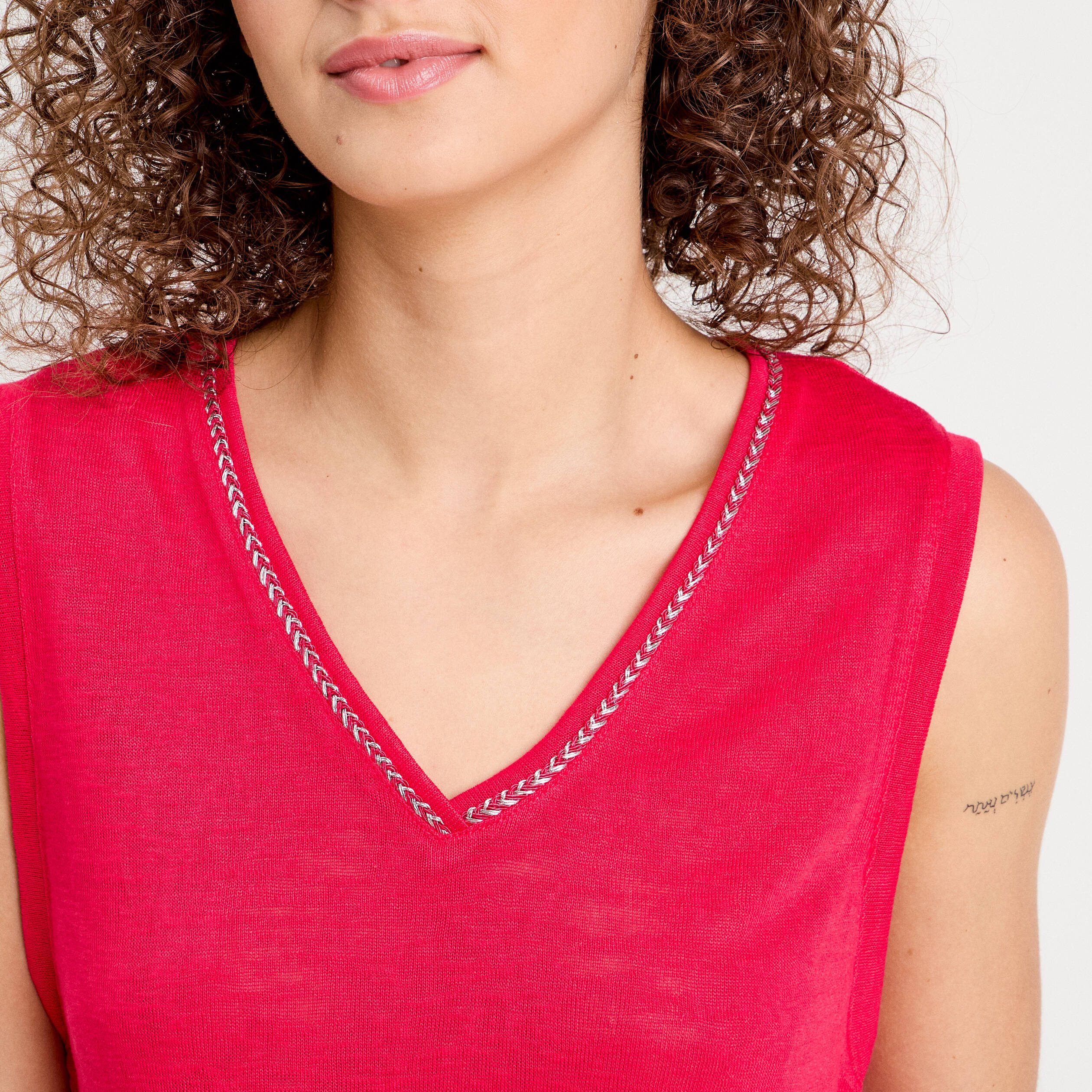 D&eacute;bardeur d&eacute;tail noeud rose vif femme