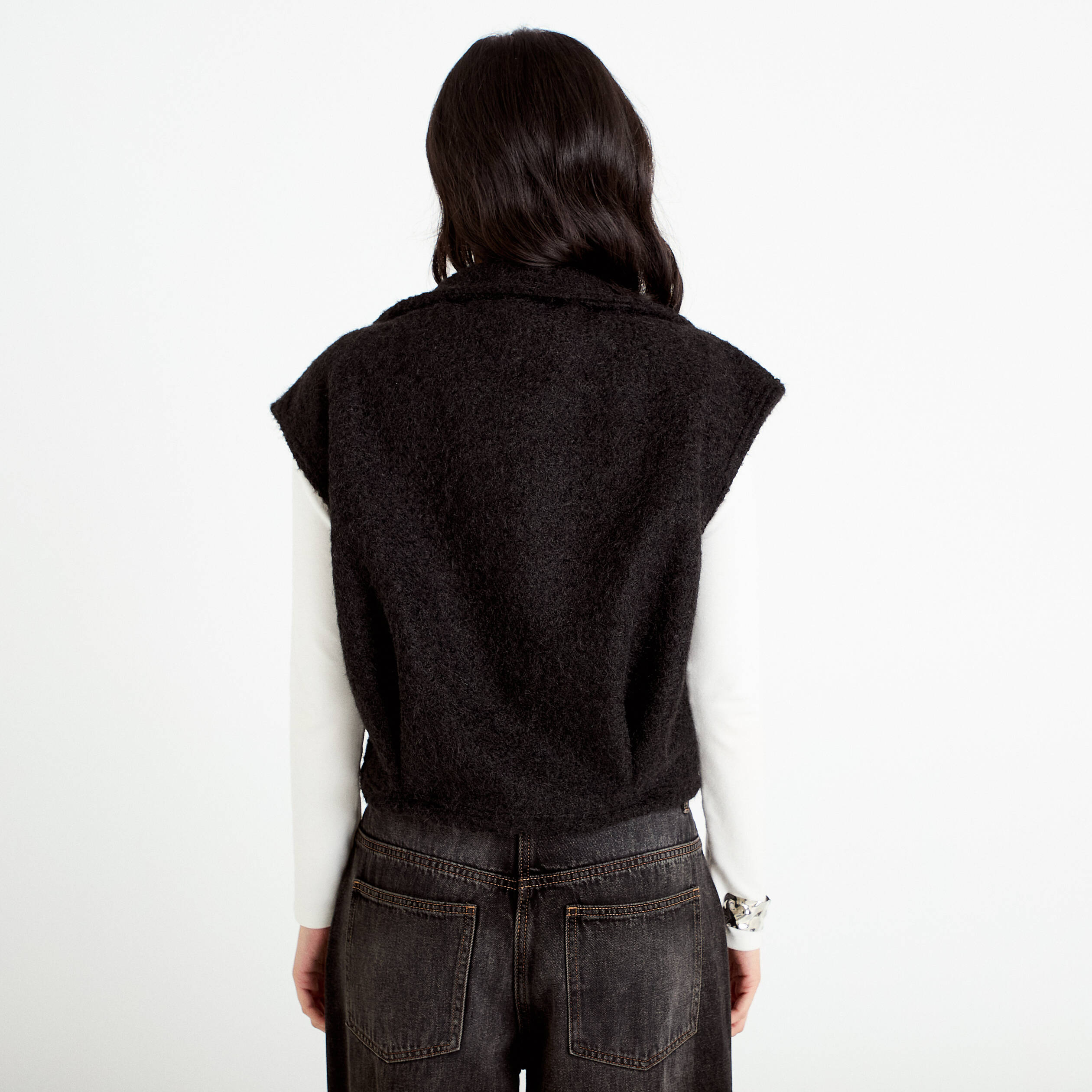 Veste bouclette sans manches col montant noir femme