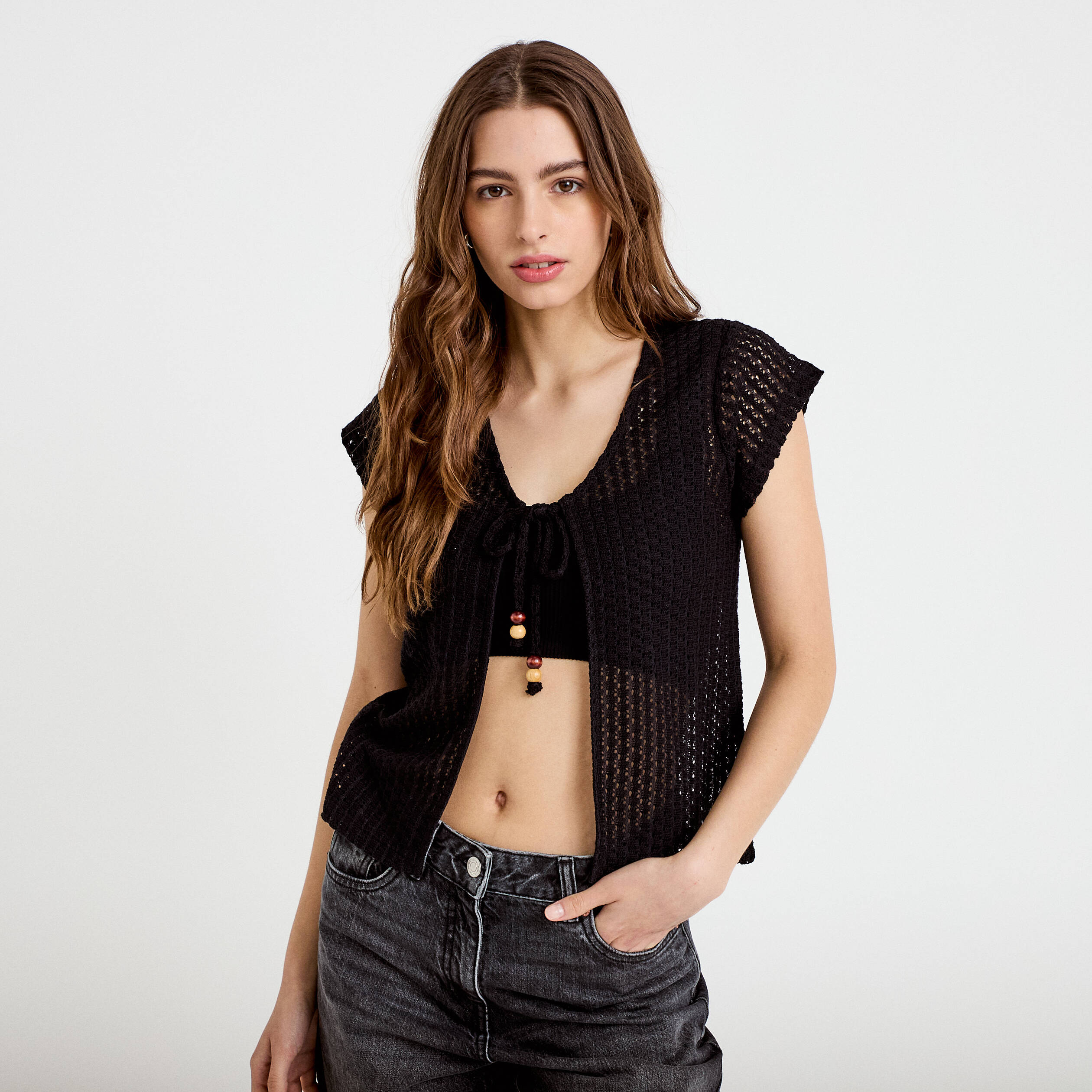 Gilet manches courtes aspect dentelle noir femme