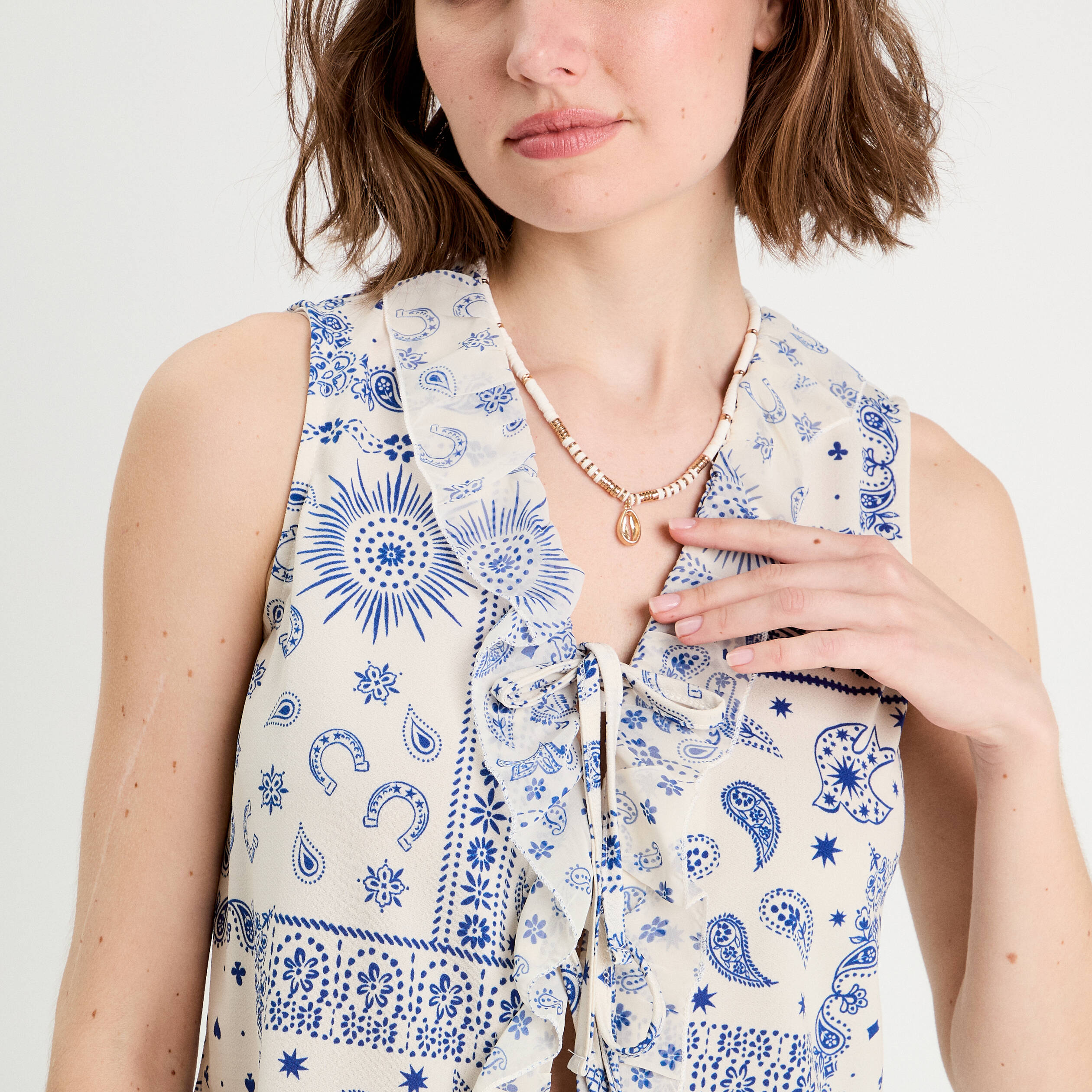 Blouse nou&eacute;e sans manches blanc femme