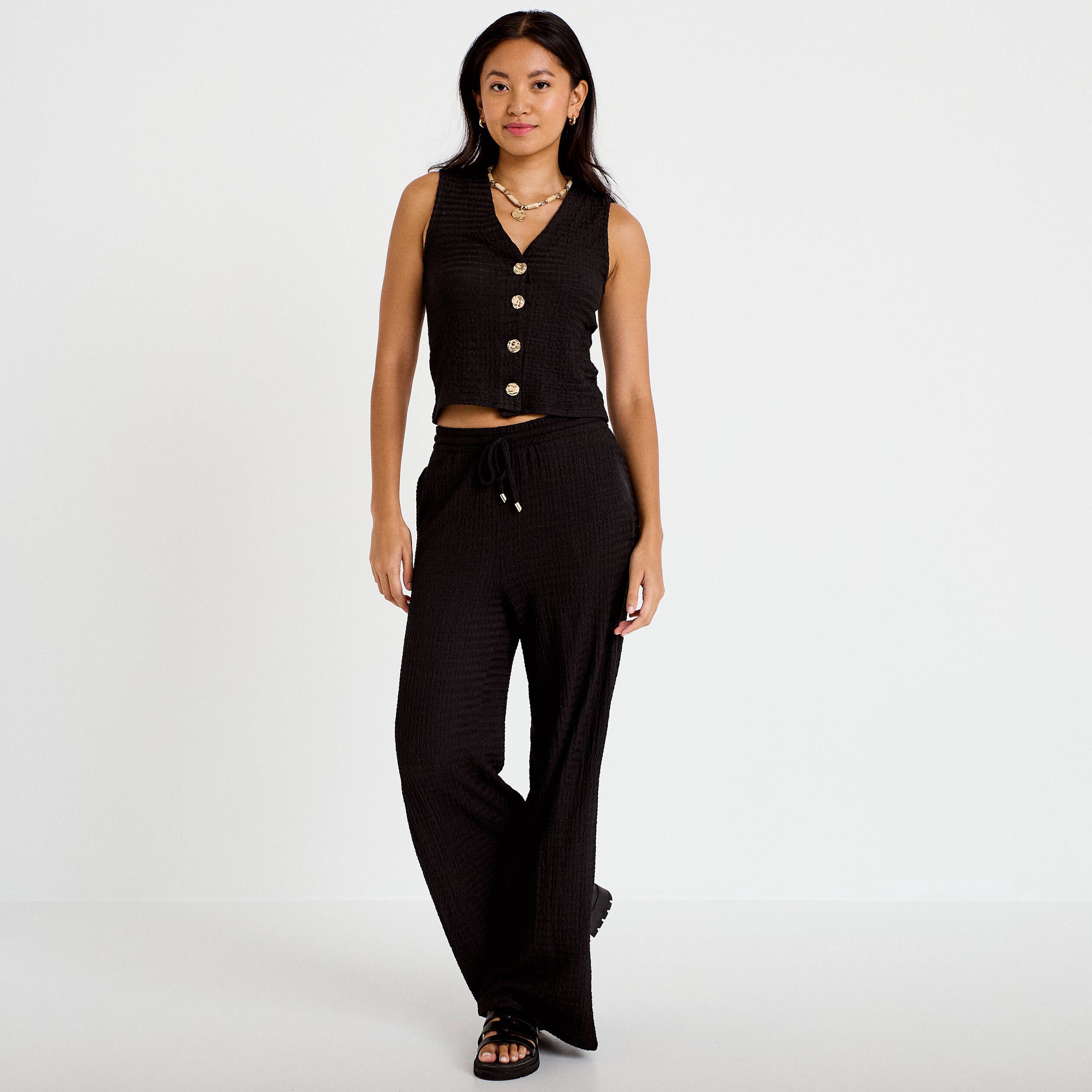 Gilet cintr&eacute; sans manches col v noir femme