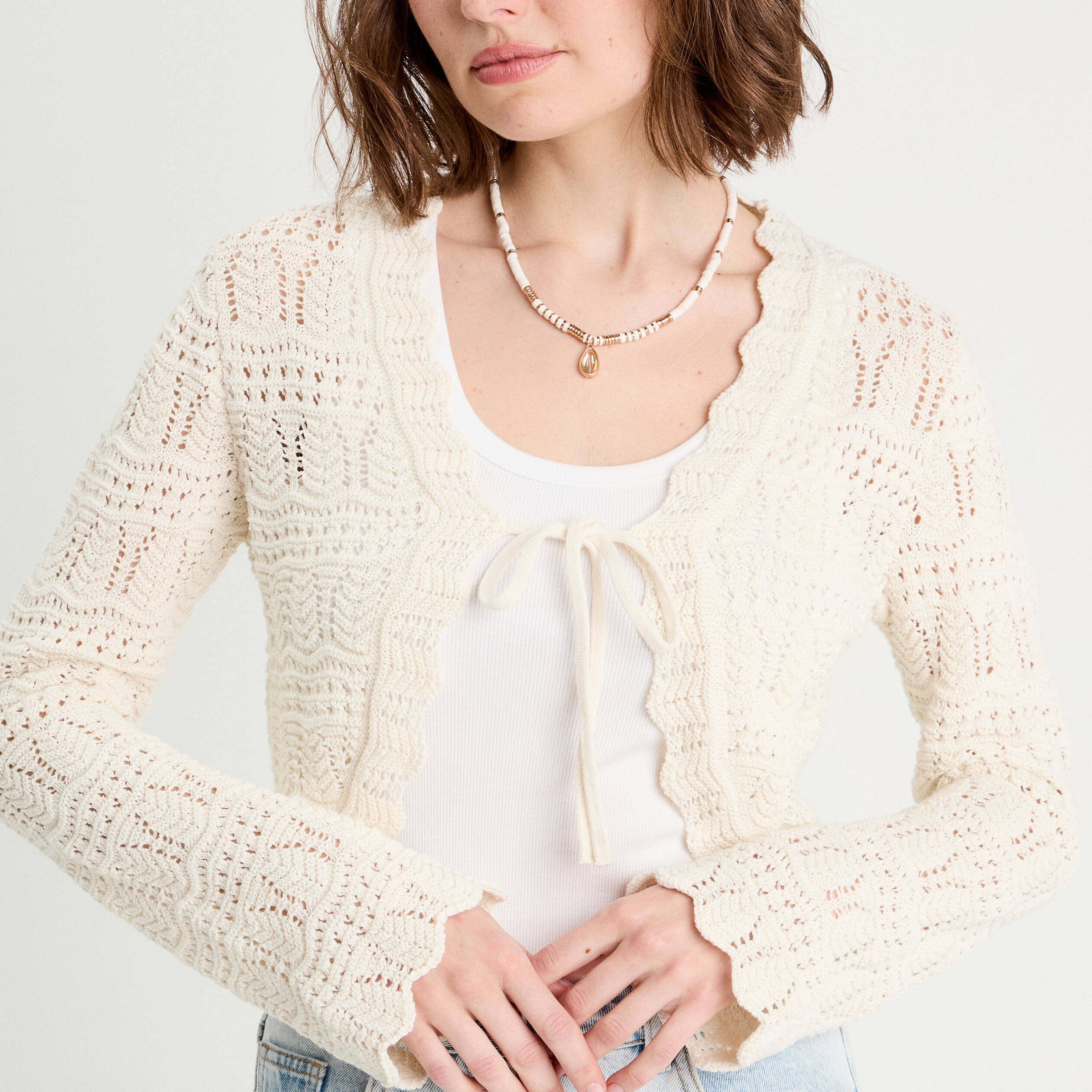 Gilet ajour&eacute; nou&eacute; ecru femme