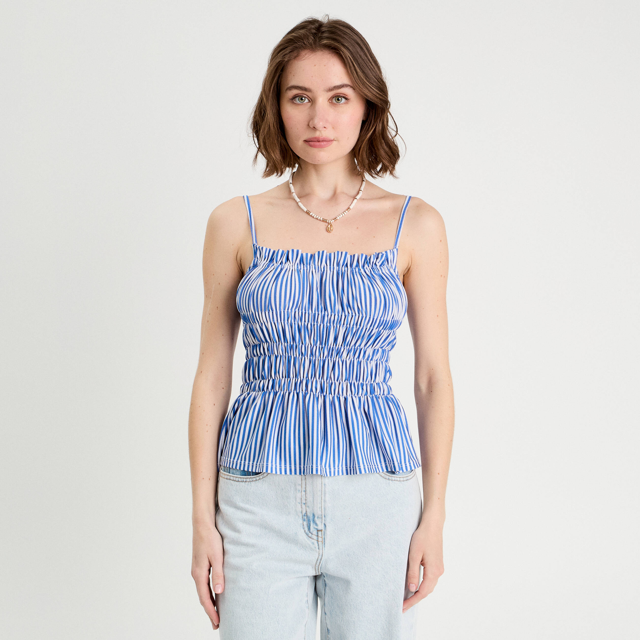 debardeur smocke bretelles fines bleu clair femme Débardeur smocké bretelles fines bleu clair femme