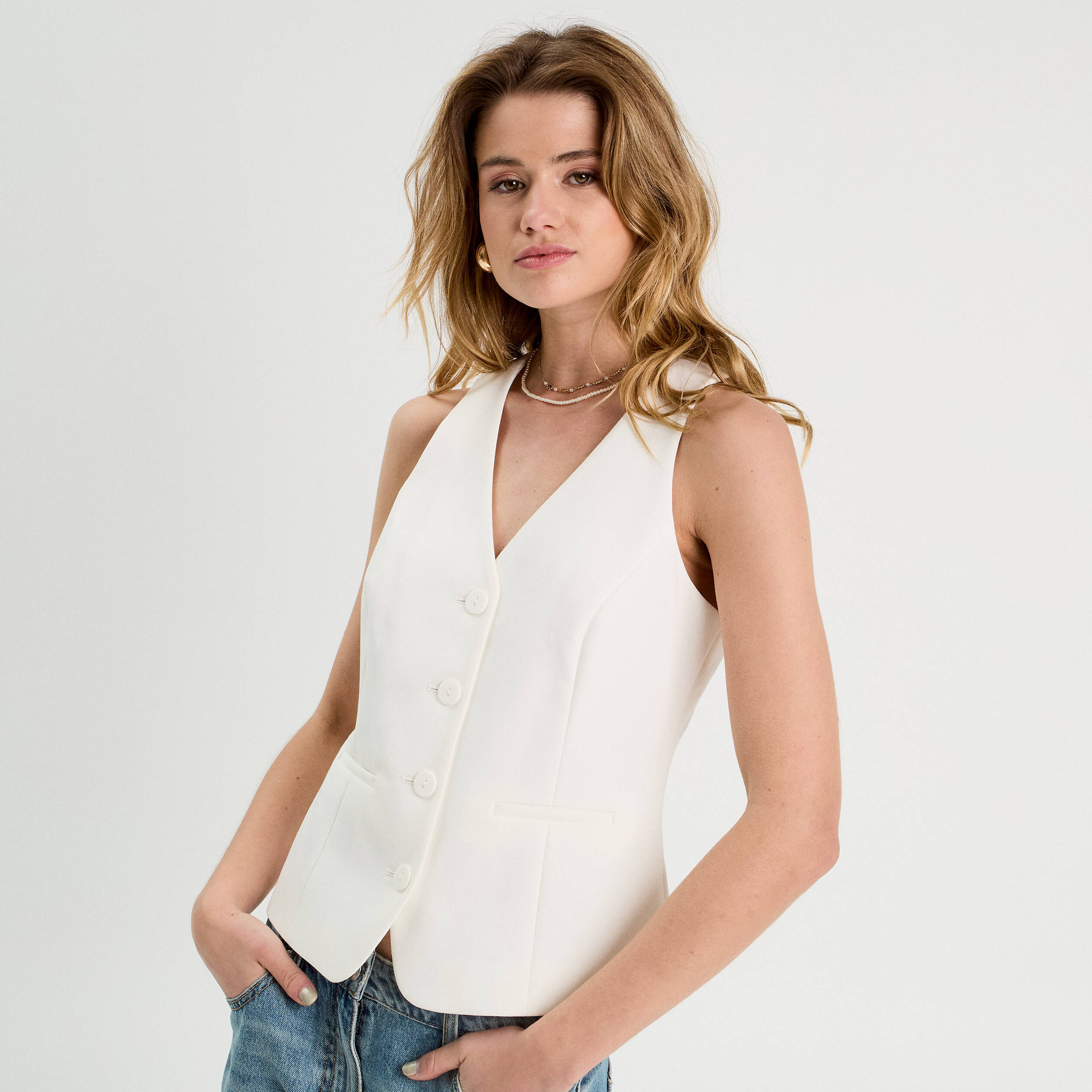Veston sans manches ecru femme