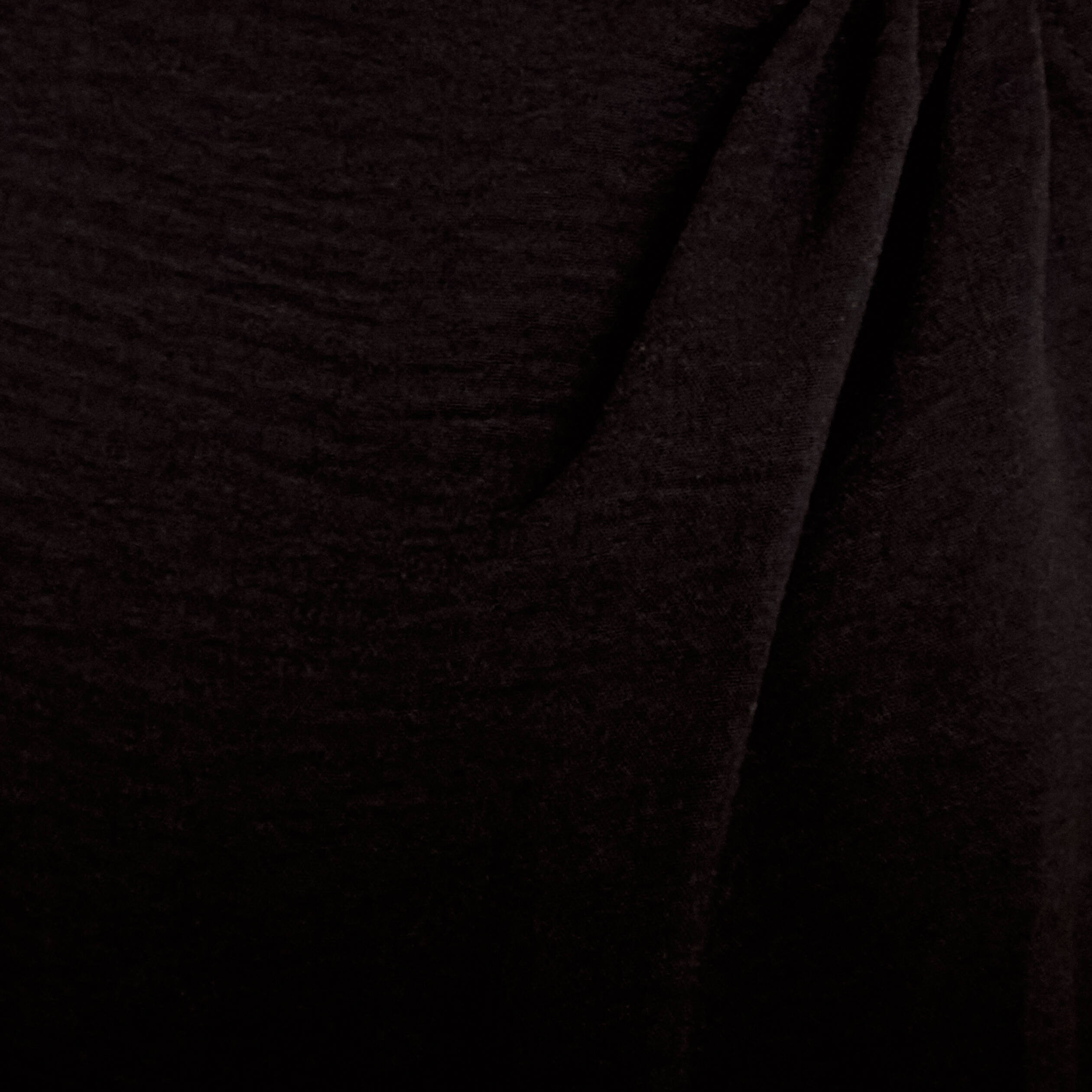 Combinaison large sans manches col rond noir femme