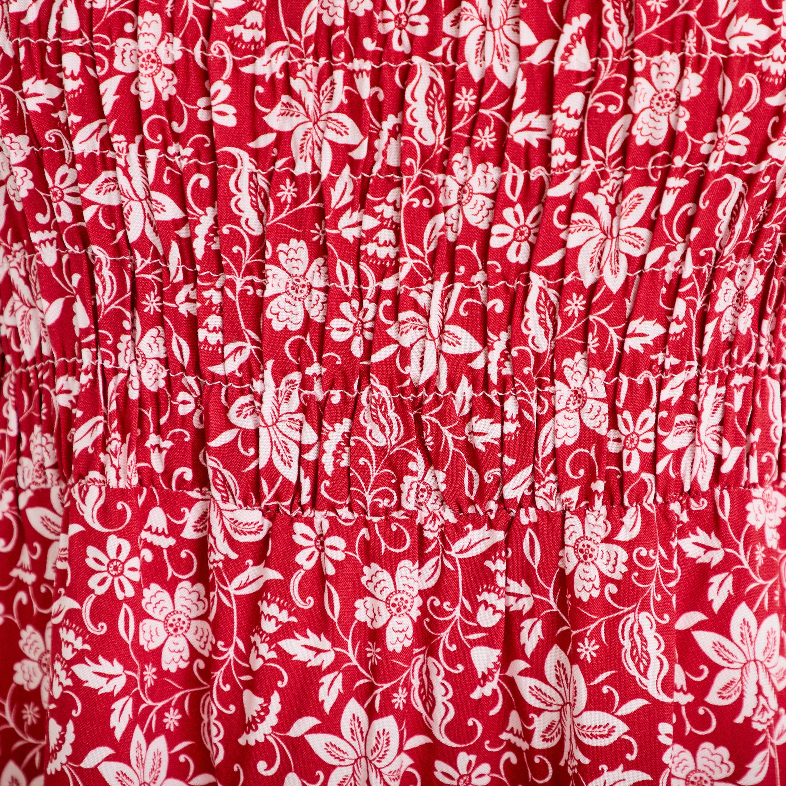 Robe longue &eacute;vas&eacute;e smock&eacute;e rouge femme
