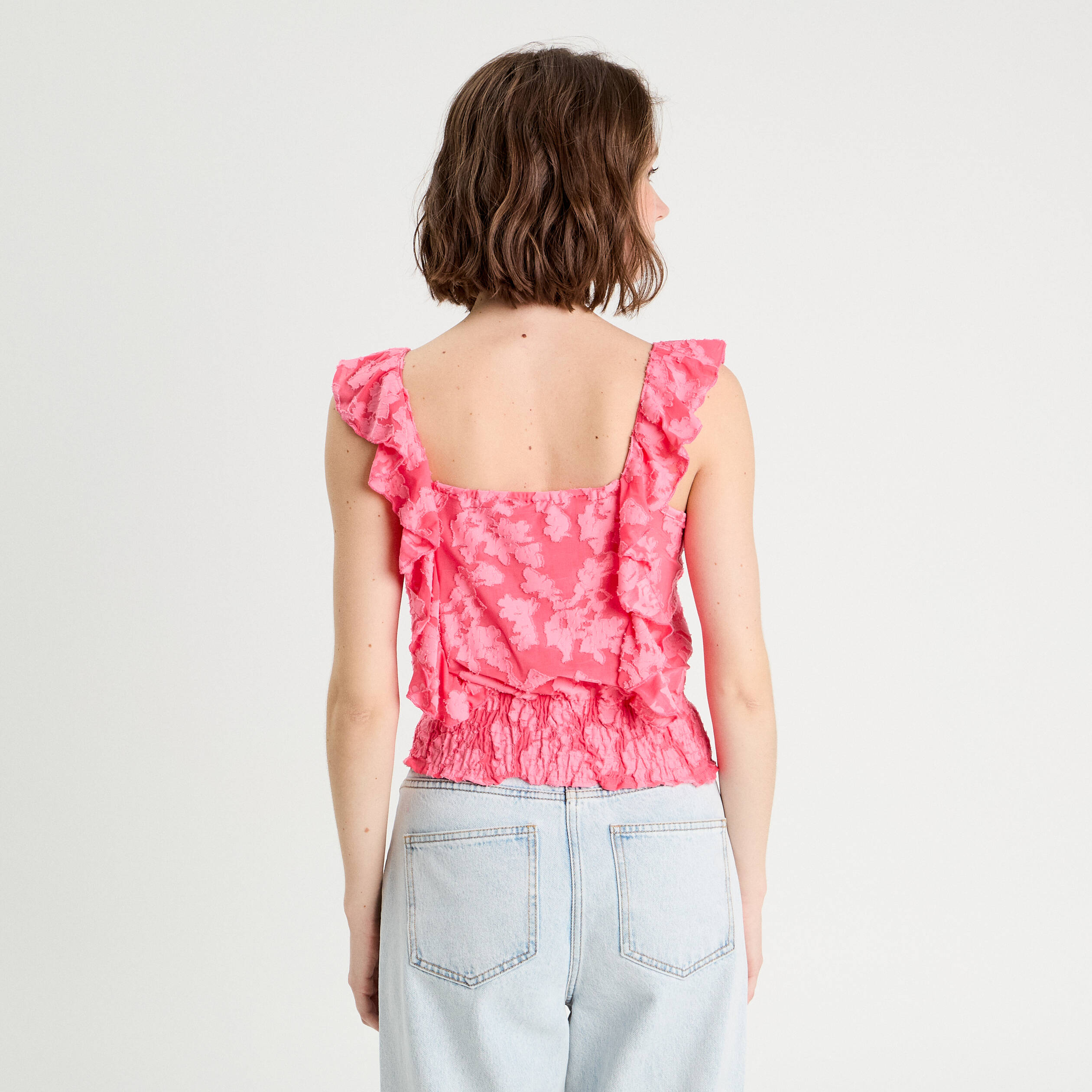 debardeur sans manches volants rose femme Débardeur sans manches volants rose femme