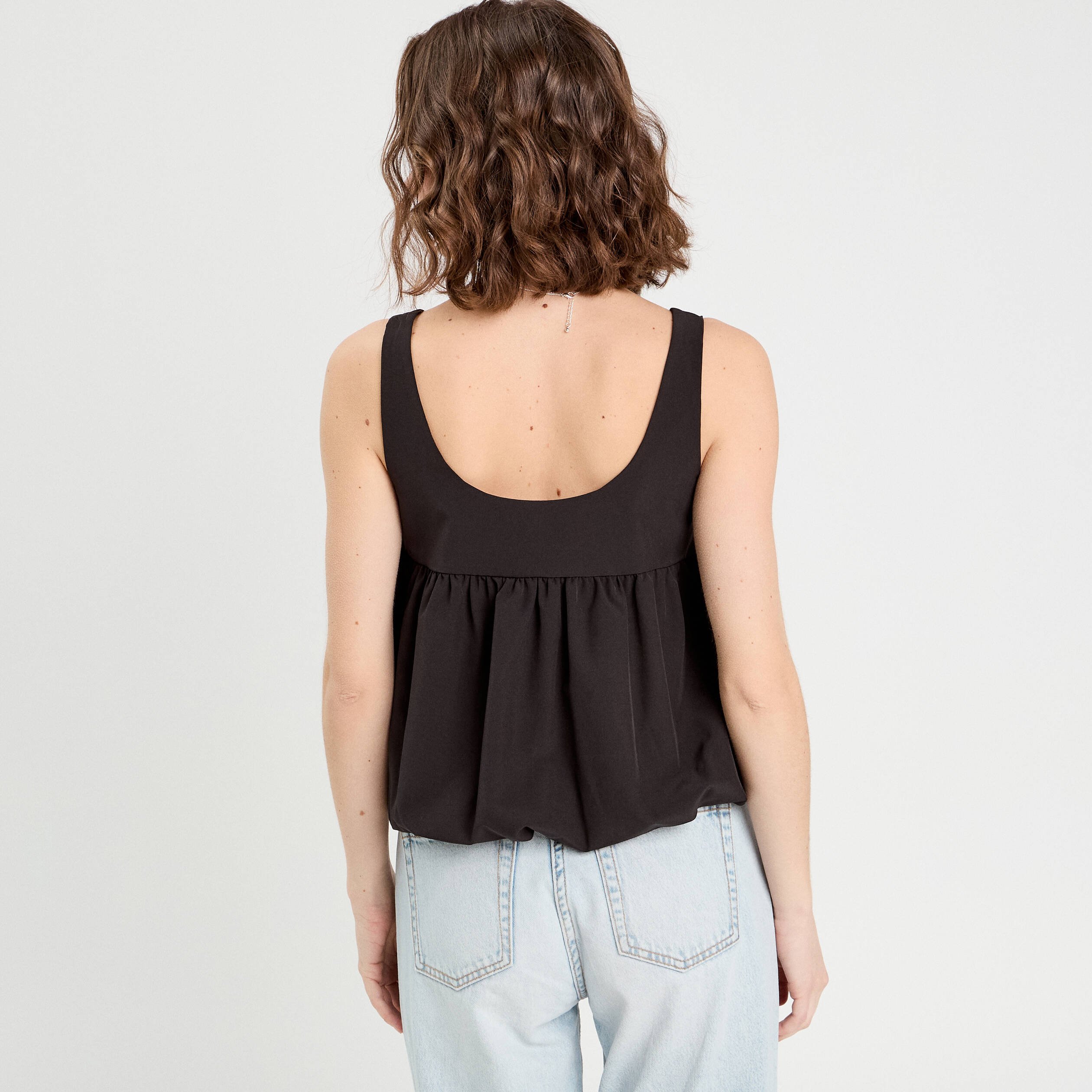 debardeur effet boule et noeud noir femme Débardeur effet boule et noeud noir femme