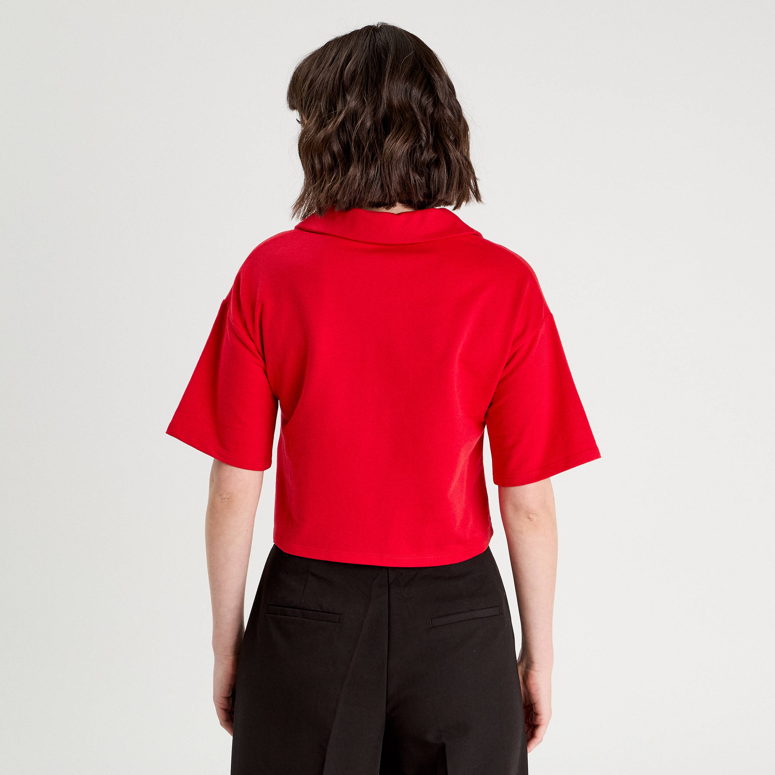 Polo avec patch brod&eacute; rouge femme