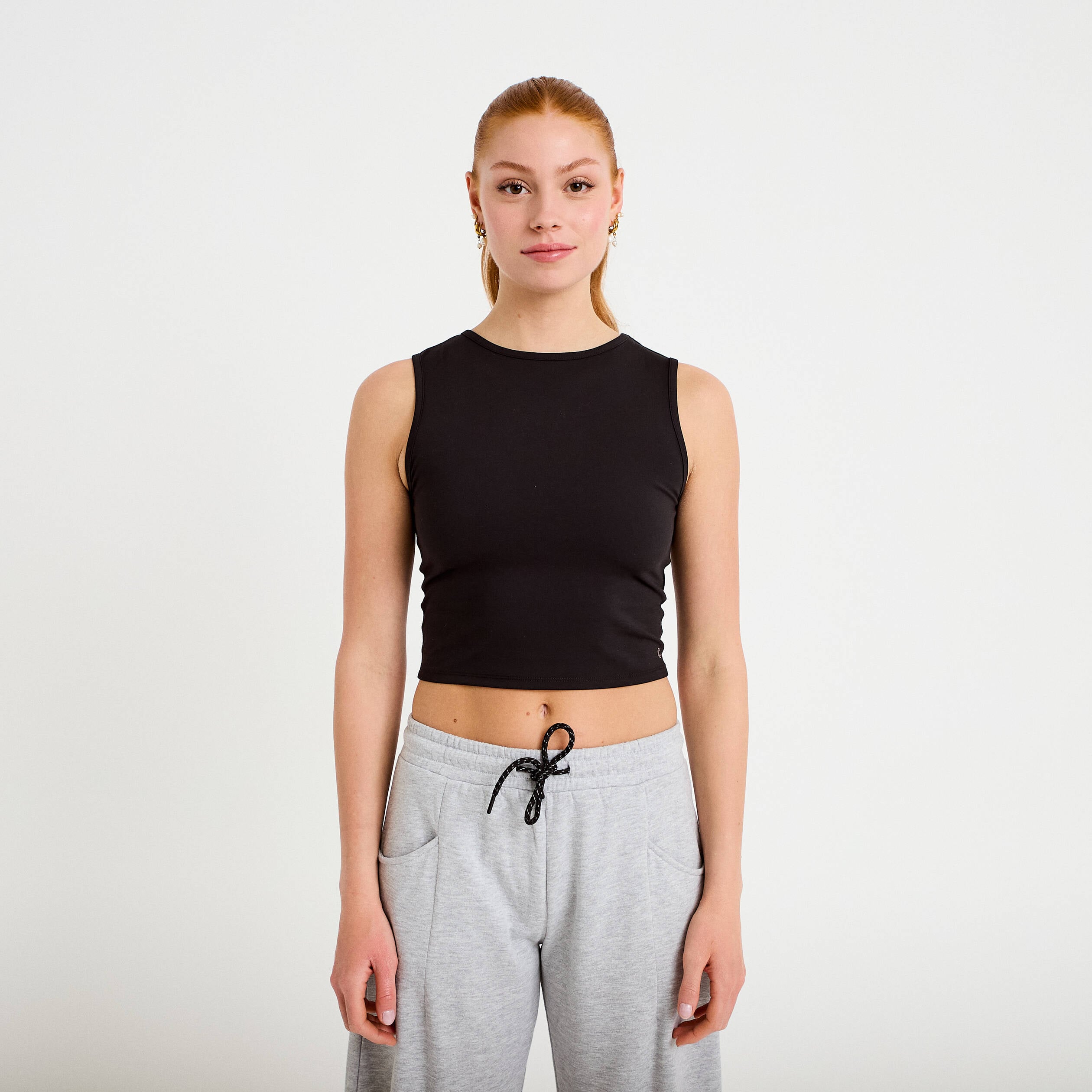 D&eacute;bardeur col rond activewear noir femme
