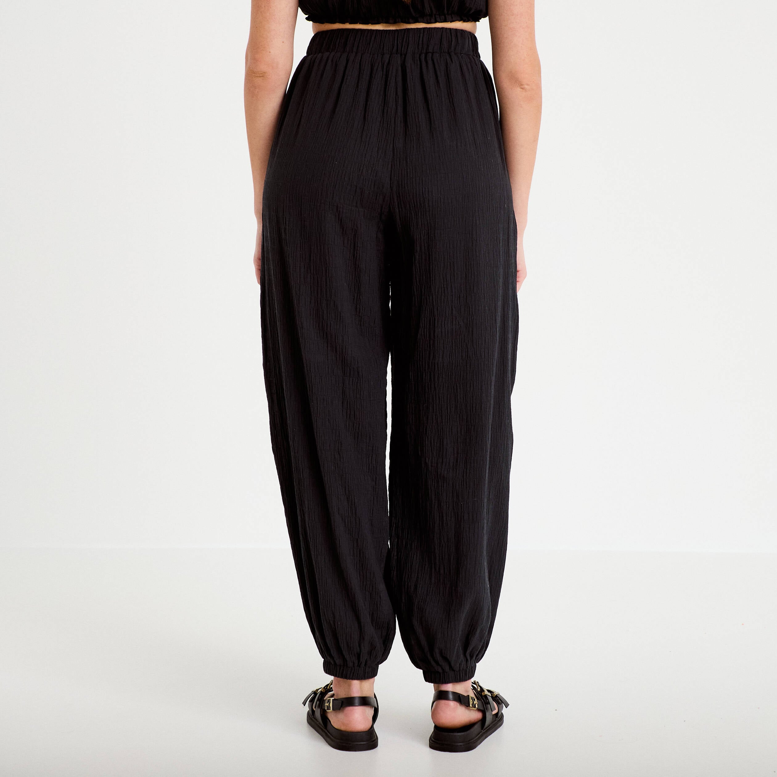 Pantalon large taille haute pliss&eacute; noir femme