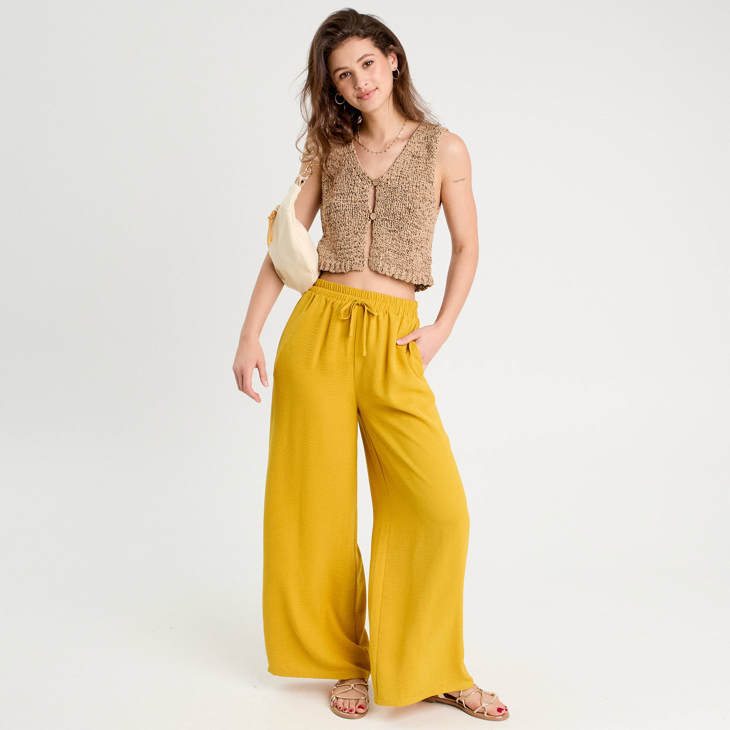 Gilet cropped sans manches beige femme