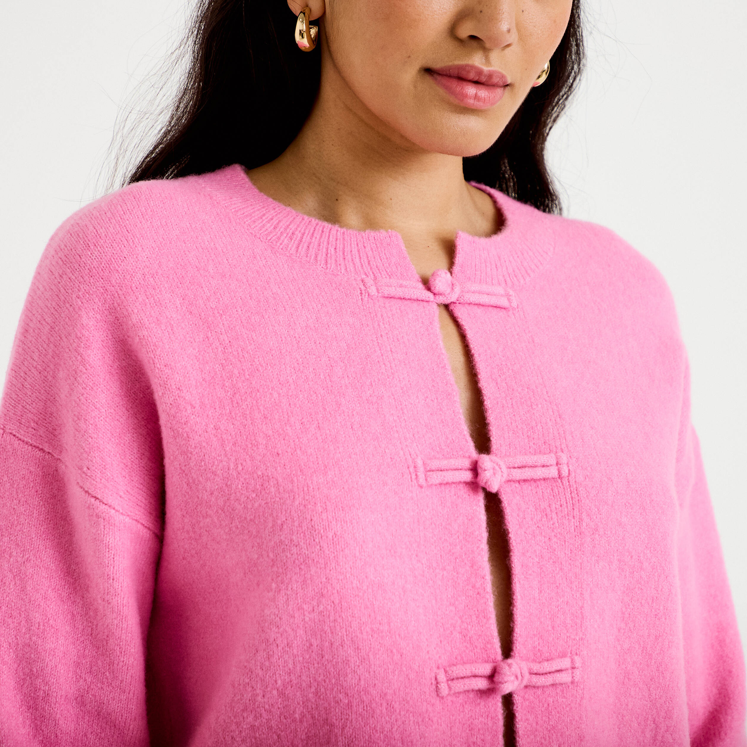 Gilet col rond manches longues avec lien rose clair femme