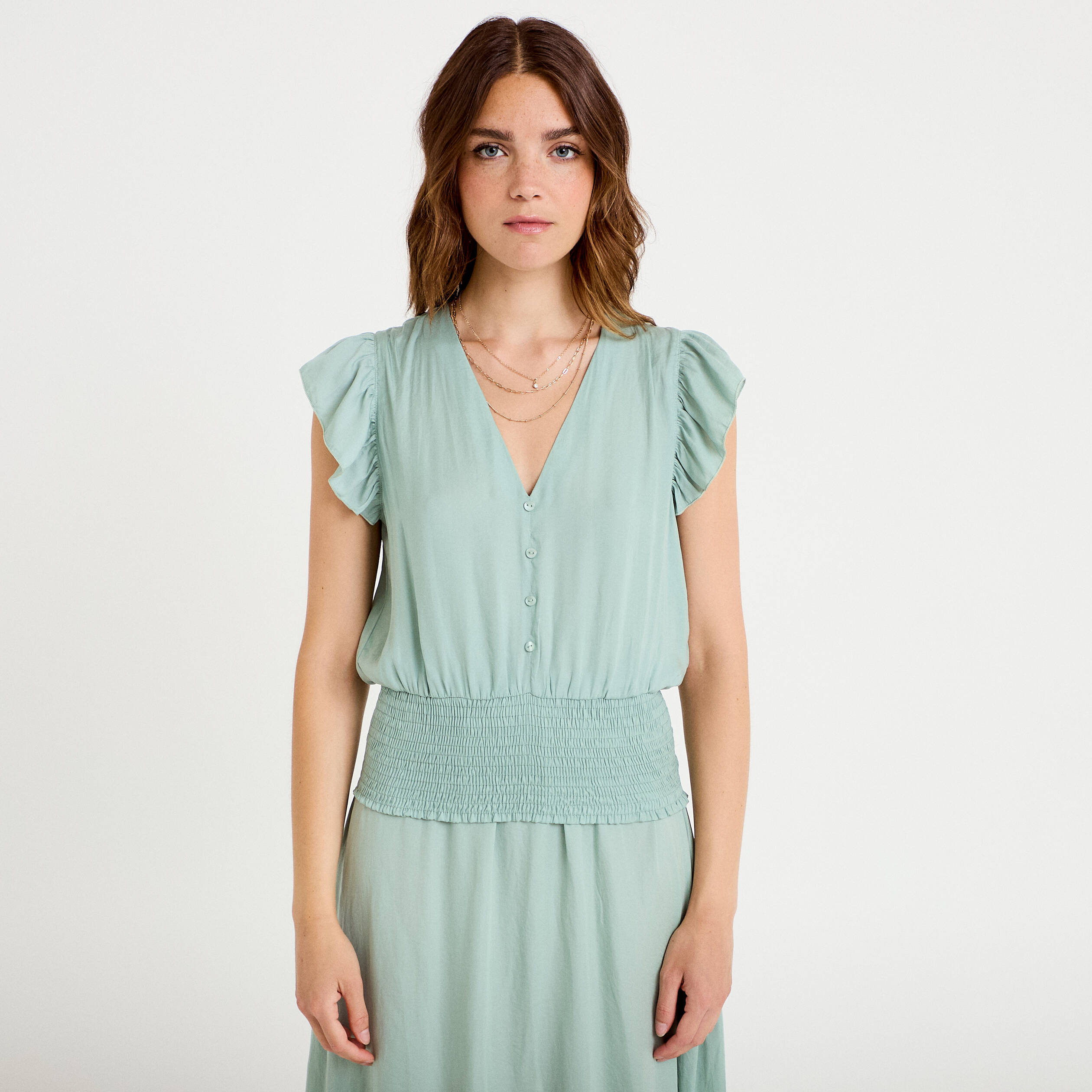 Blouse cintr&eacute;e col v manches courtes vert pastel femme