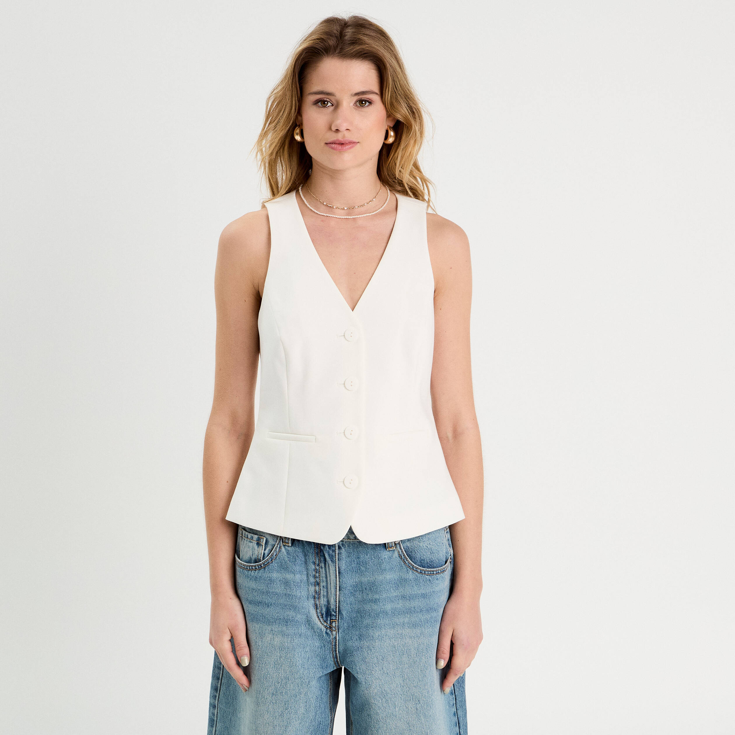 Veston sans manches ecru femme