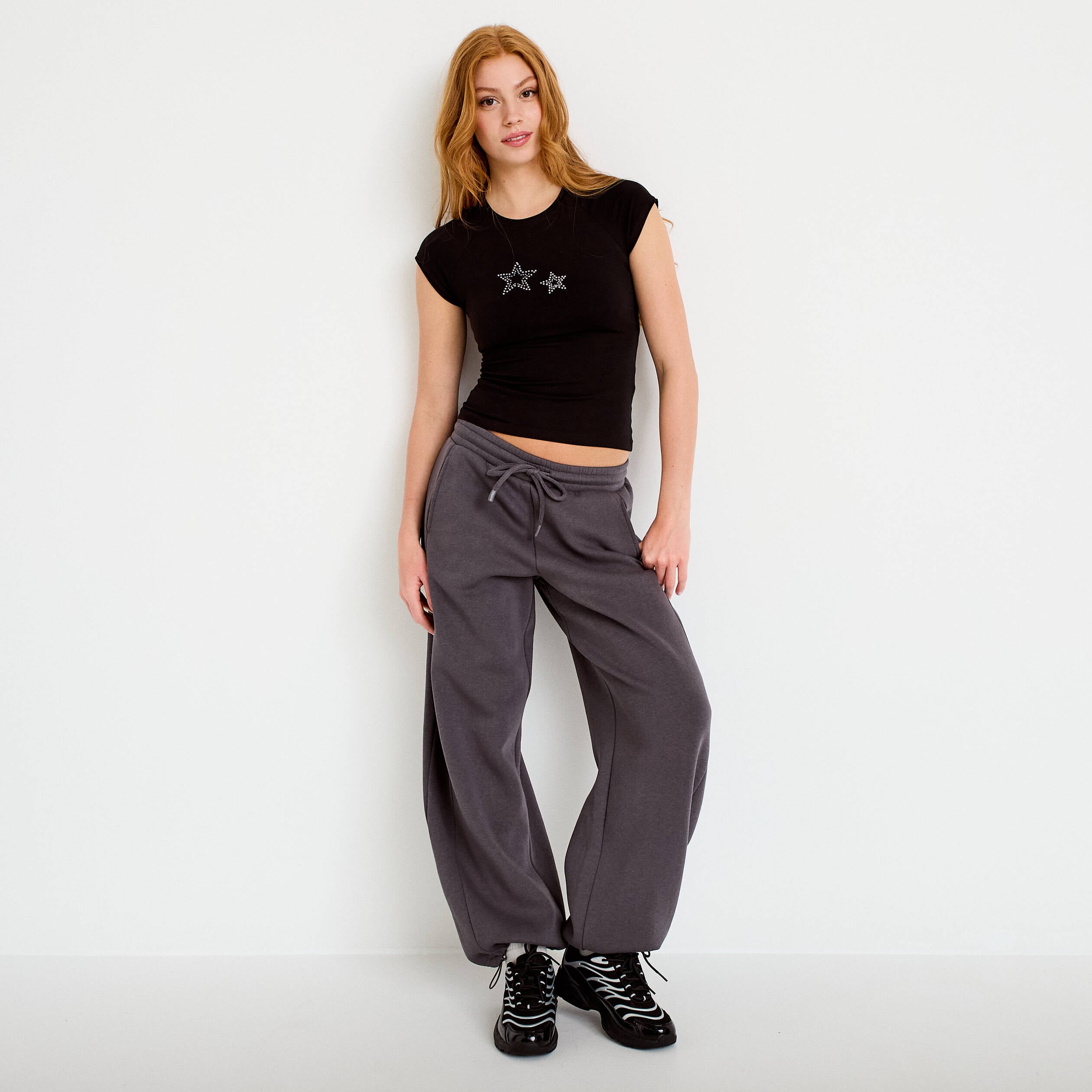 Jogging large taille basse gris fonc&eacute; femme