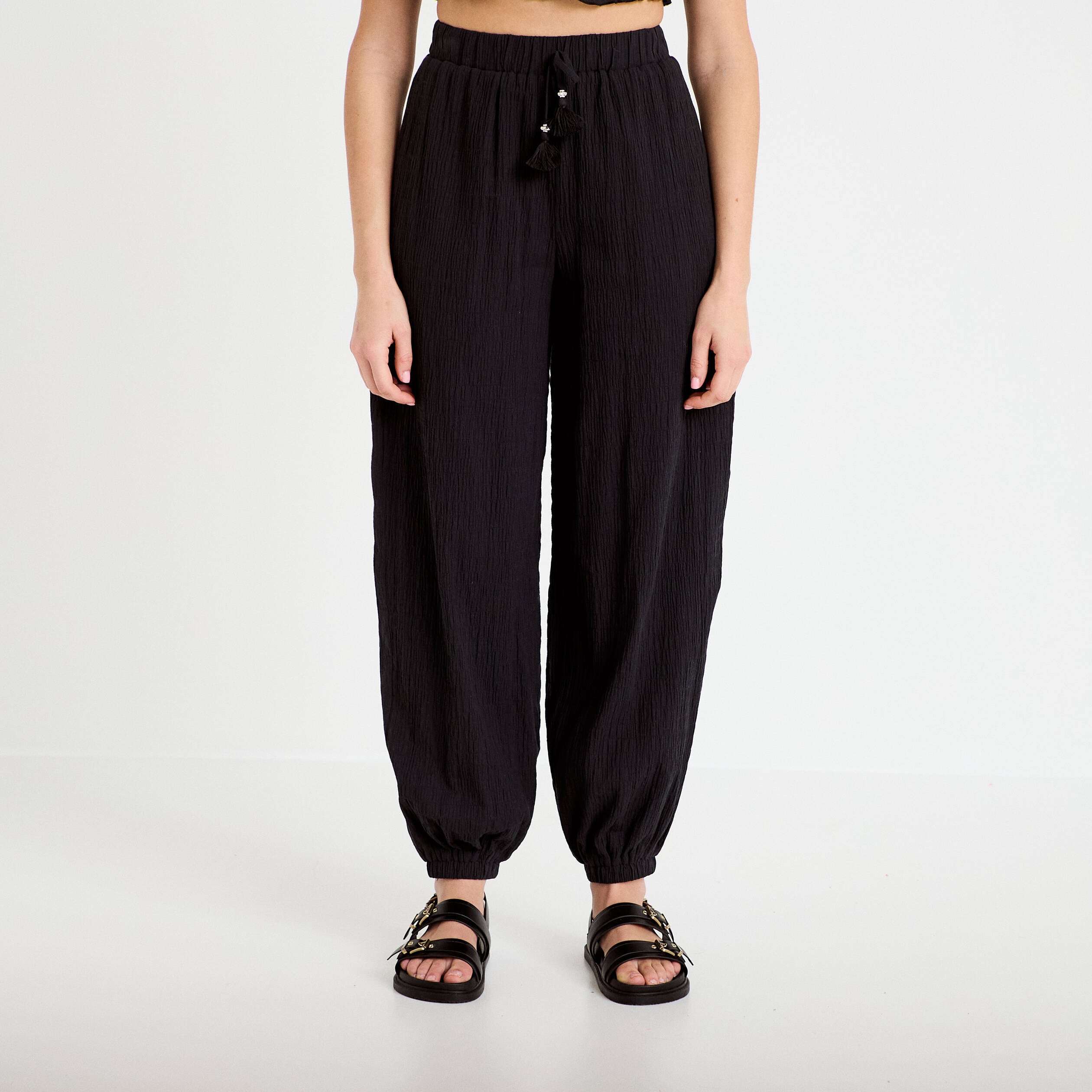 Pantalon large taille haute pliss&eacute; noir femme
