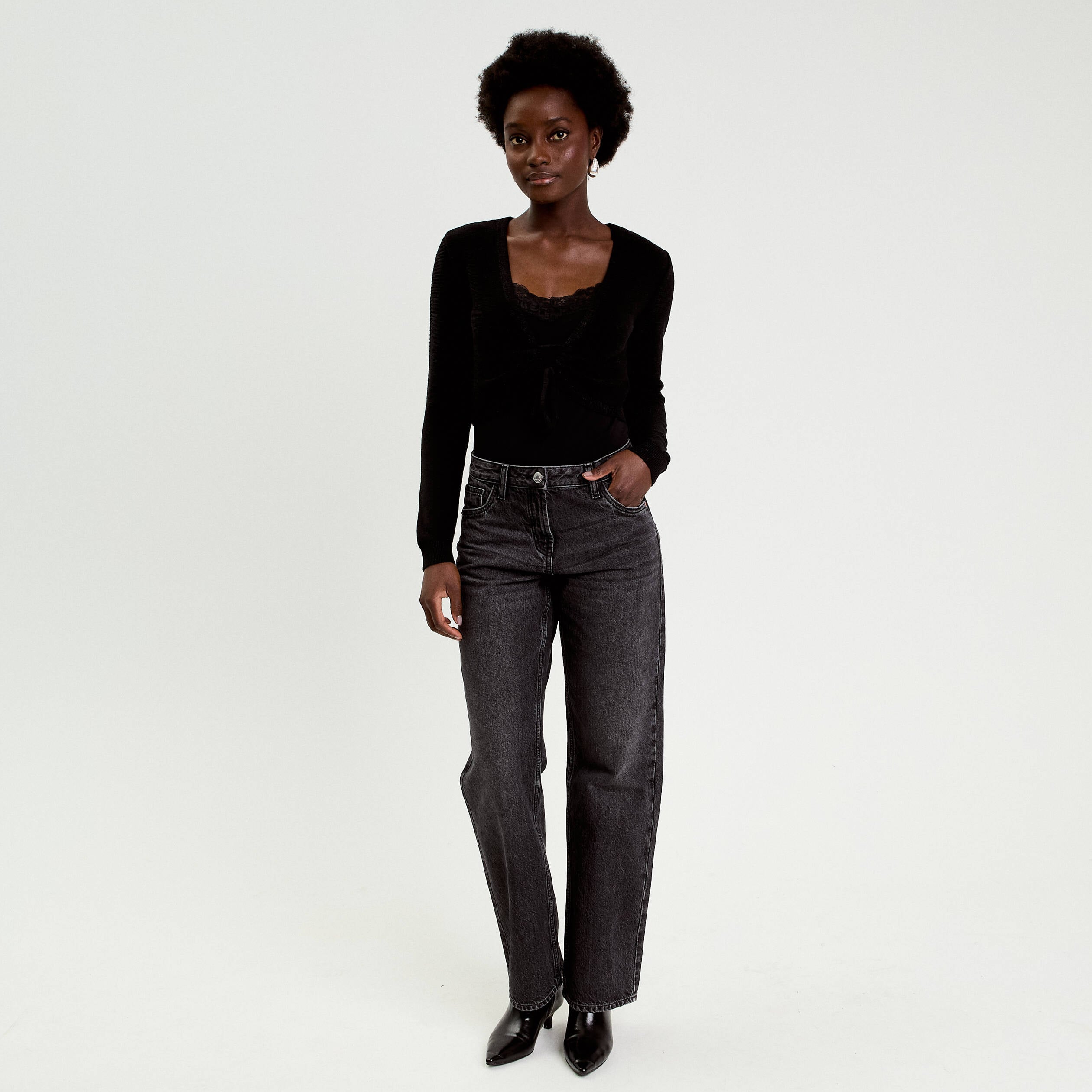 Pull cropped avec noeud noir femme