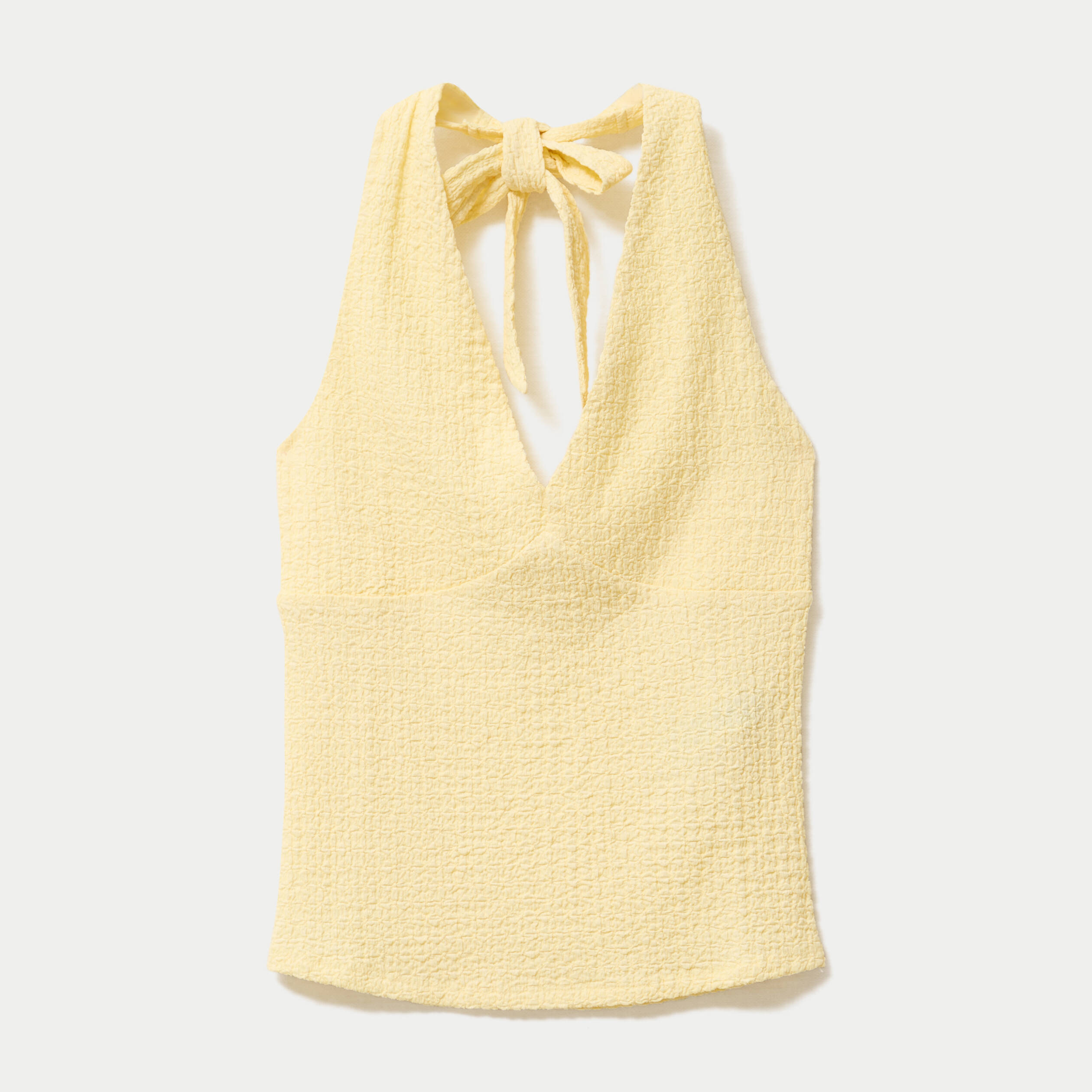 Top cintr&eacute; sans manches avec relief jaune pastel femme