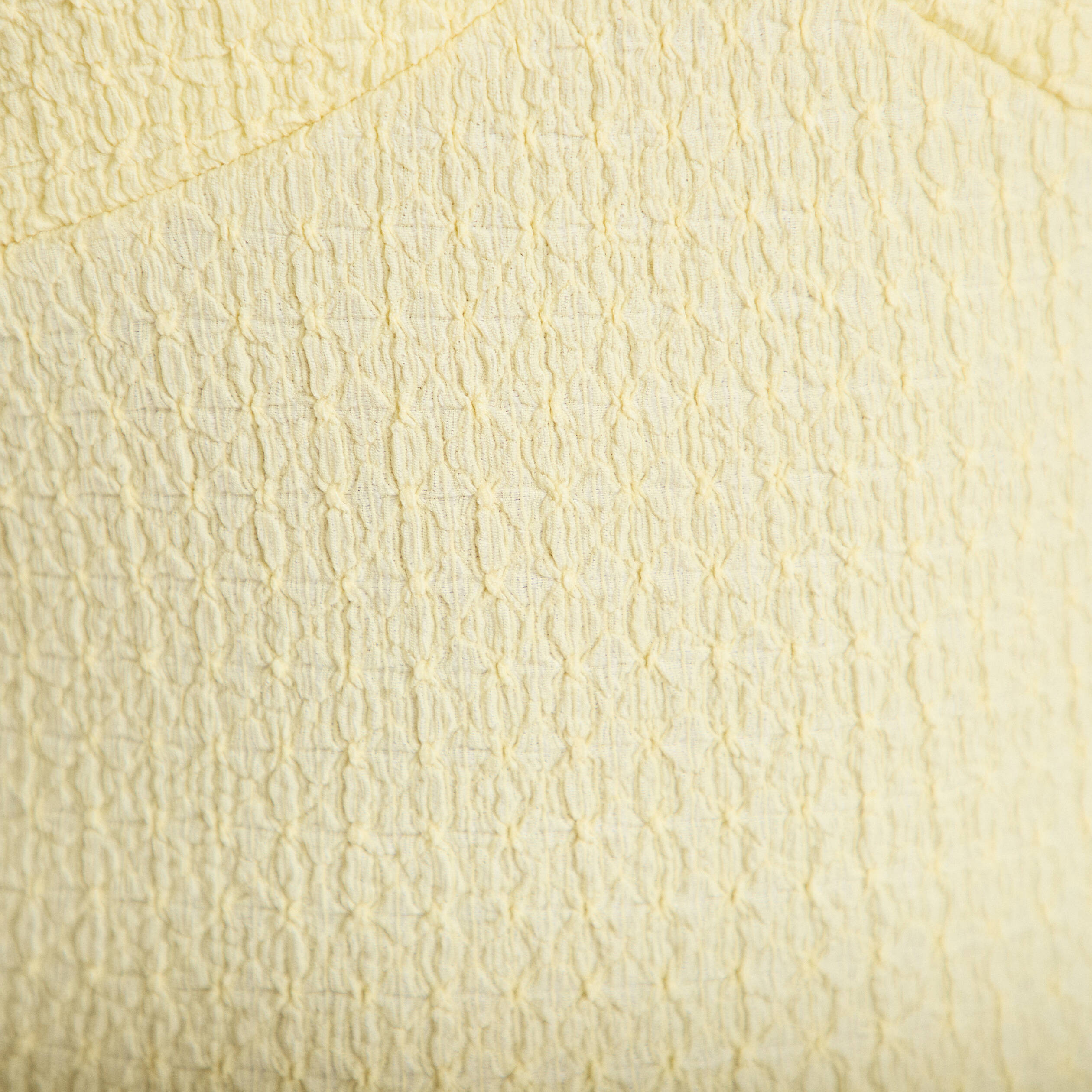 Top cintr&eacute; sans manches avec relief jaune pastel femme
