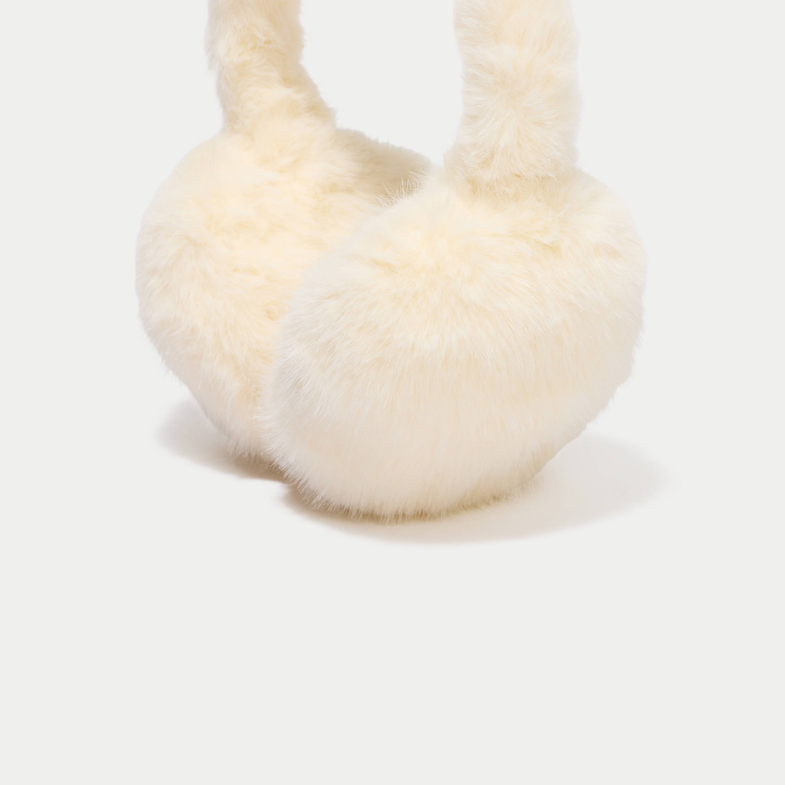 Cache-oreilles en fausse fourrure jaune pastel